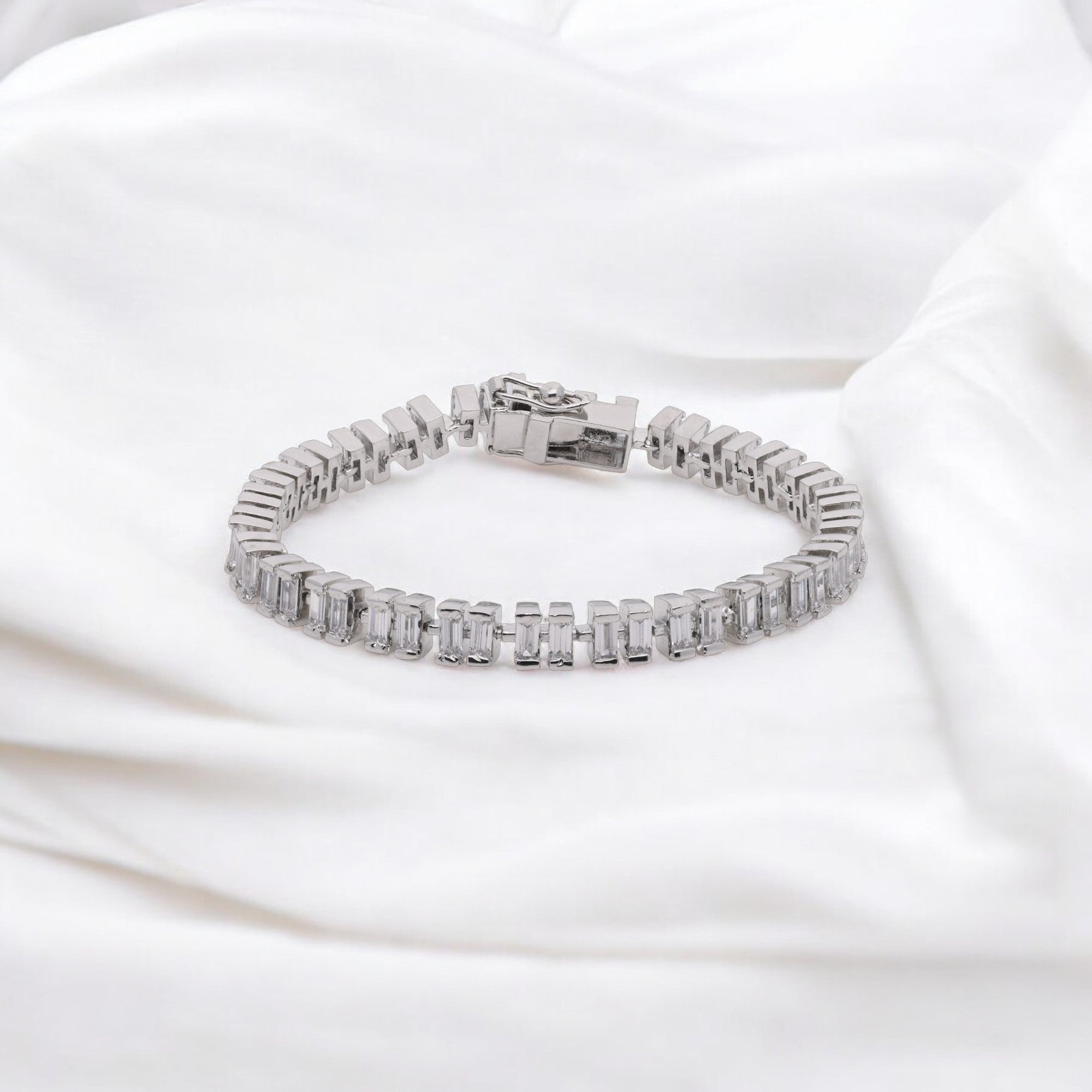 Celestia Baguette-Cut Crystal Tennis Bracelet in Polished Silver Finish | SKU : 0003534540