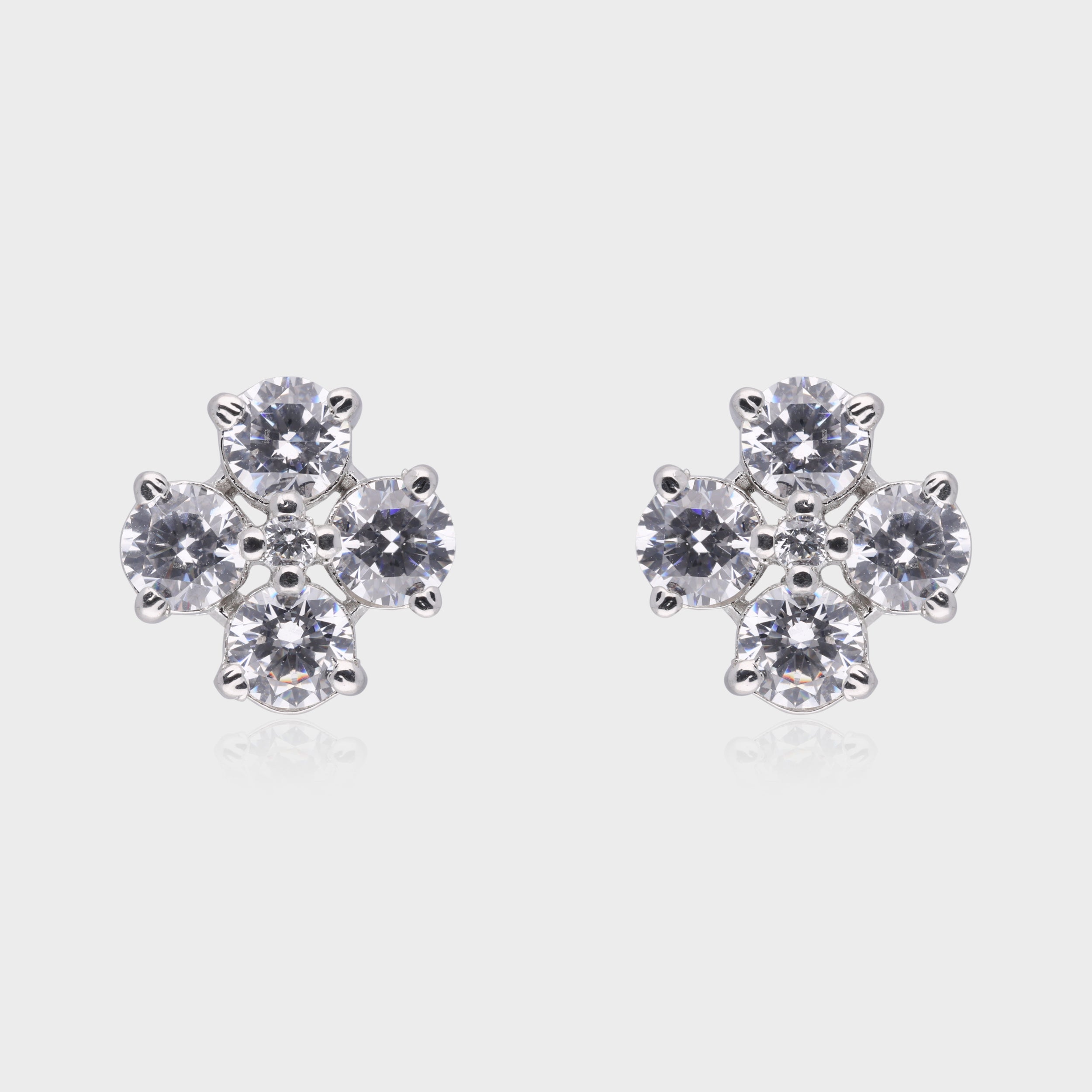 Radiant Bloom: Round-Cut White Gemstone Floral Stud Earrings in Sterling Silver | SKU : 0003534991, 0021326769, 0021326776