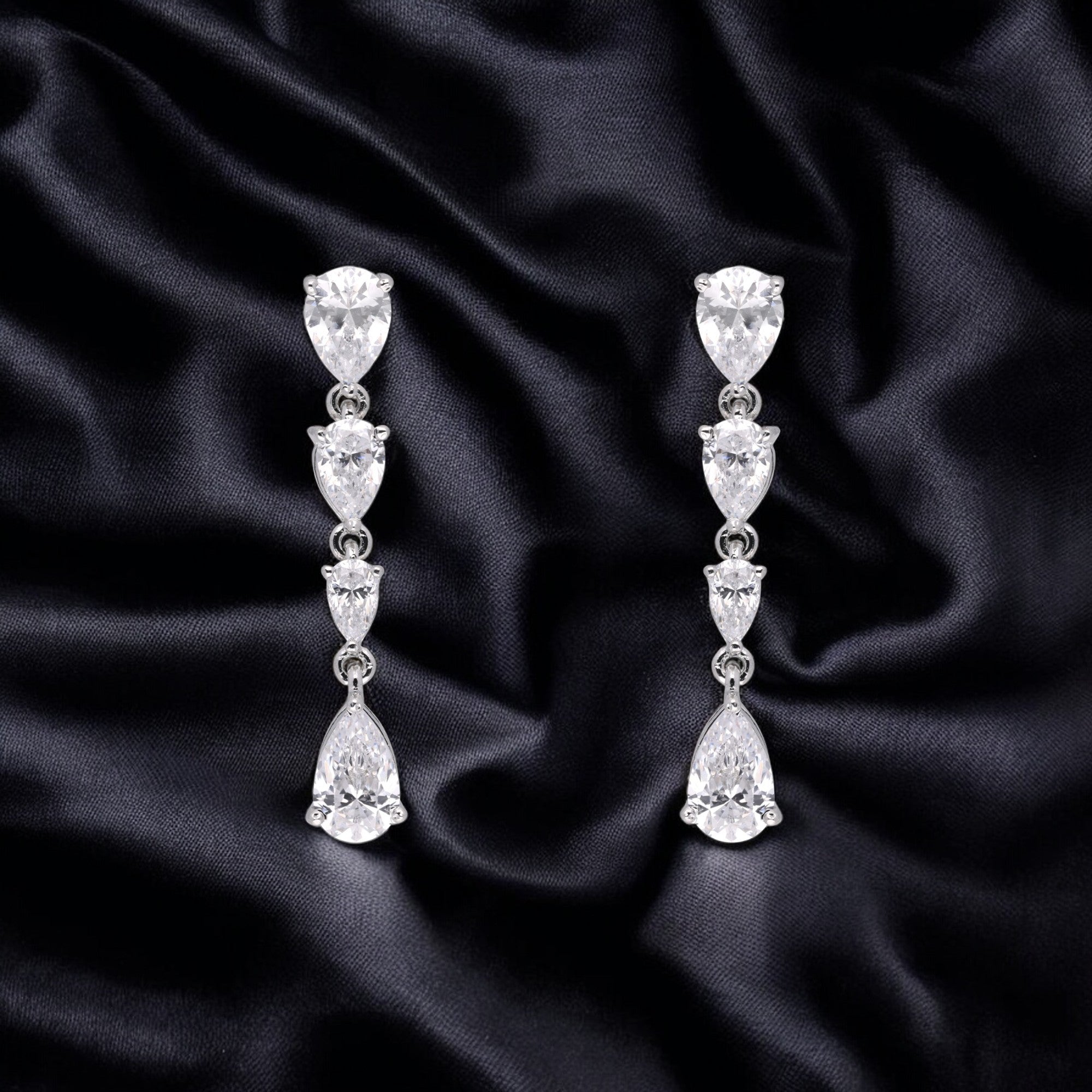 Radiant Cascading Pear-Cut Cubic Zirconia Silver Drop Earrings | SKU : 0003535103, 0021327100, 0021327117