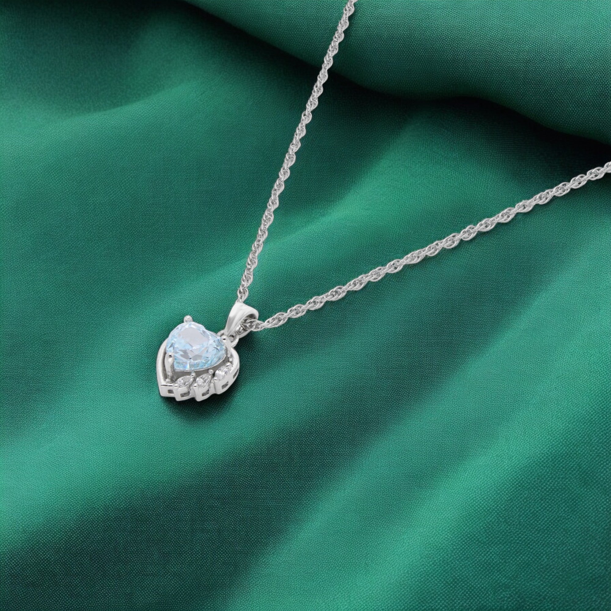 Sterling Silver Heart Pendant with Sky Blue Gemstone Elegant Accents SKU 0003594476, 0021456404, 0021456381, 0021456398, 0021423871
