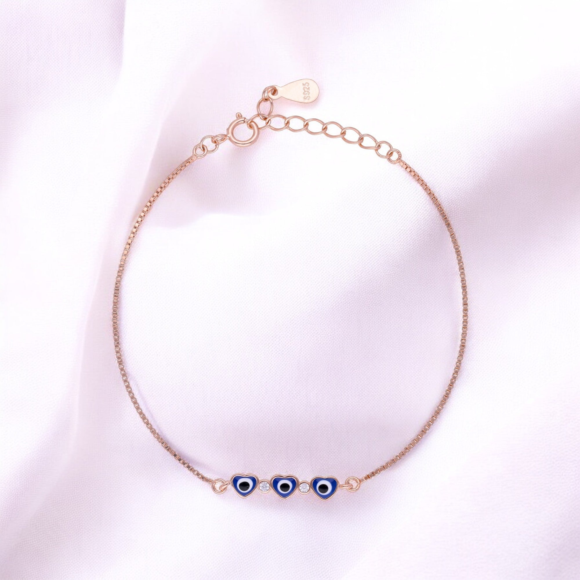 Rose Gold Tone Heart Evil Eye Bracelet with Blue Enamel Accents | SKU : 0003624180, 0021525568, 0021525575