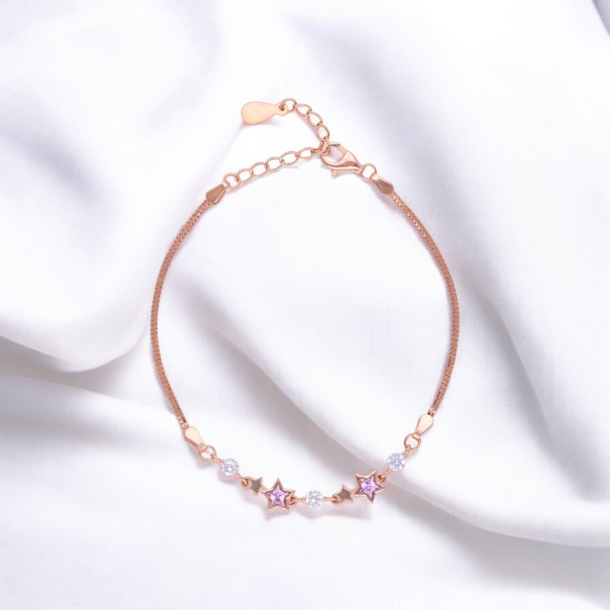 Rose-Toned Star Charm Bracelet with Pink Stones and Crystal Accents | SKU : 0021525360, 0003624203, 0021525377, 0021525353