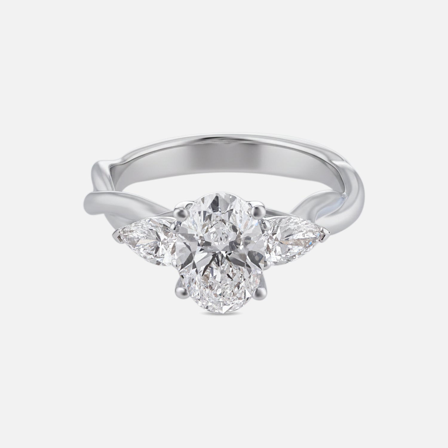 Lab Grown 2.080 Carat Pear and Oval Cut Diamond Three Stone Ring in 18 Karat Gold | SKU : 0005053759