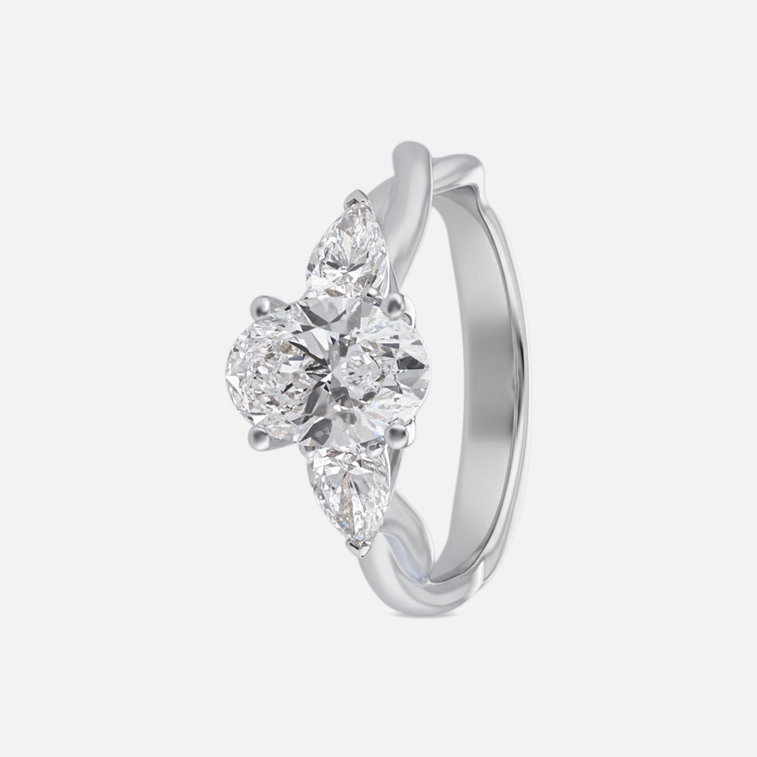 Lab Grown 2.080 Carat Pear and Oval Cut Diamond Three Stone Ring in 18 Karat Gold | SKU : 0005053759