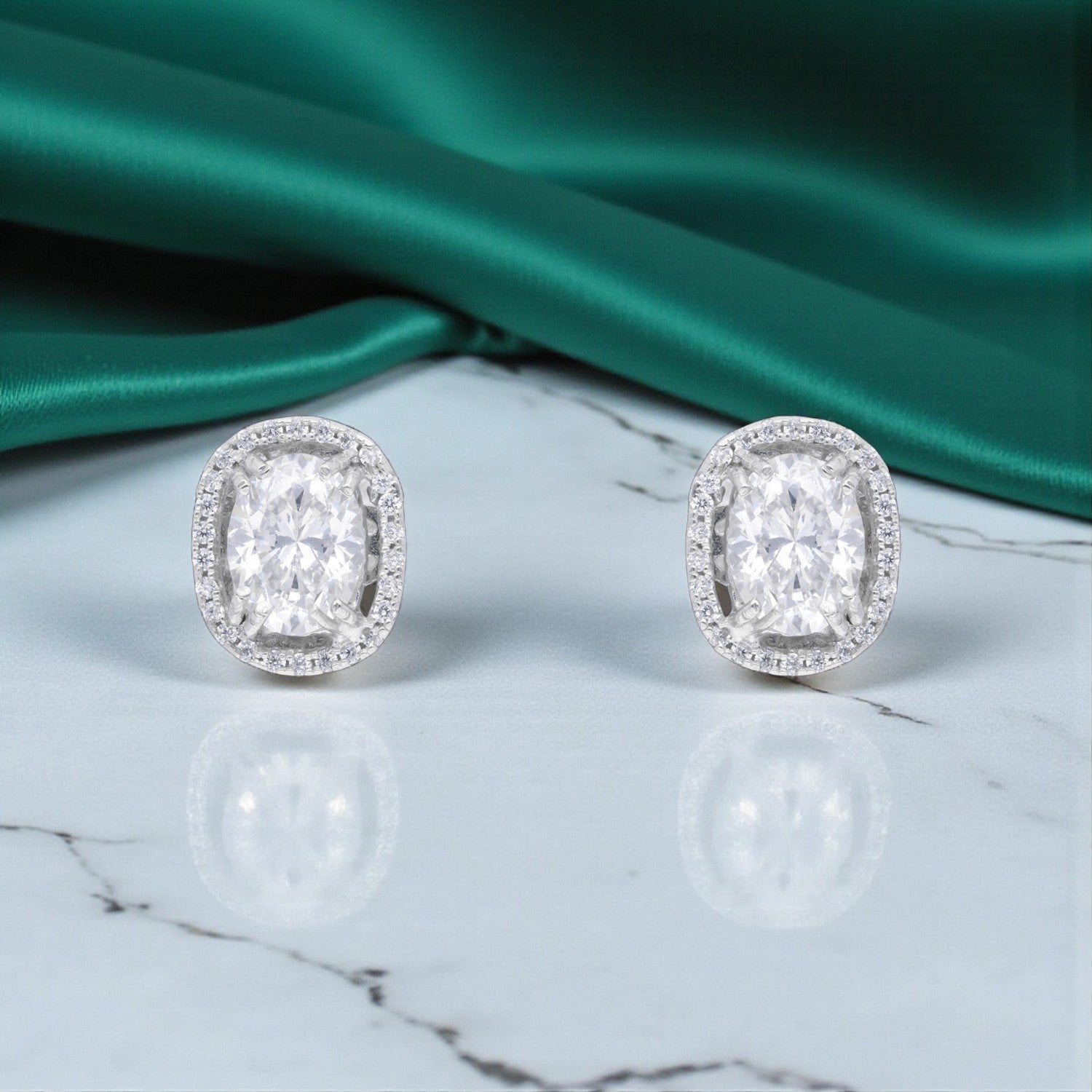 Sterling Silver Classic Oval Halo Stud Earrings | SKU : 0005476688