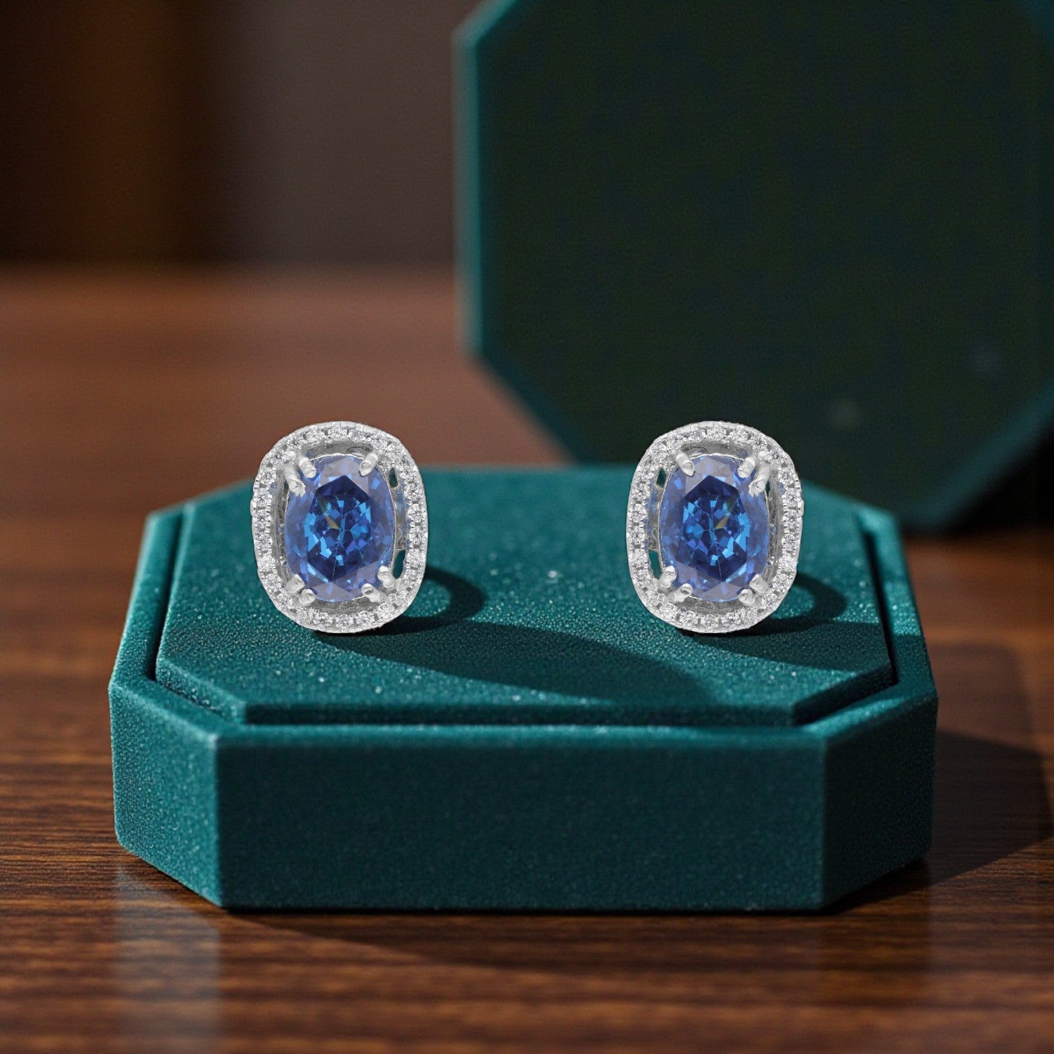 Sterling Silver Royal Blue Oval Halo Stud Earrings | SKU : 0005479511