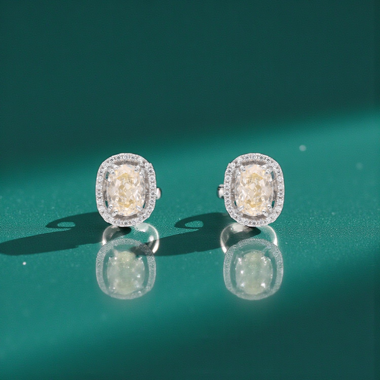 Sterling Silver Champagne Oval Halo Stud Earrings | SKU : 0005485963