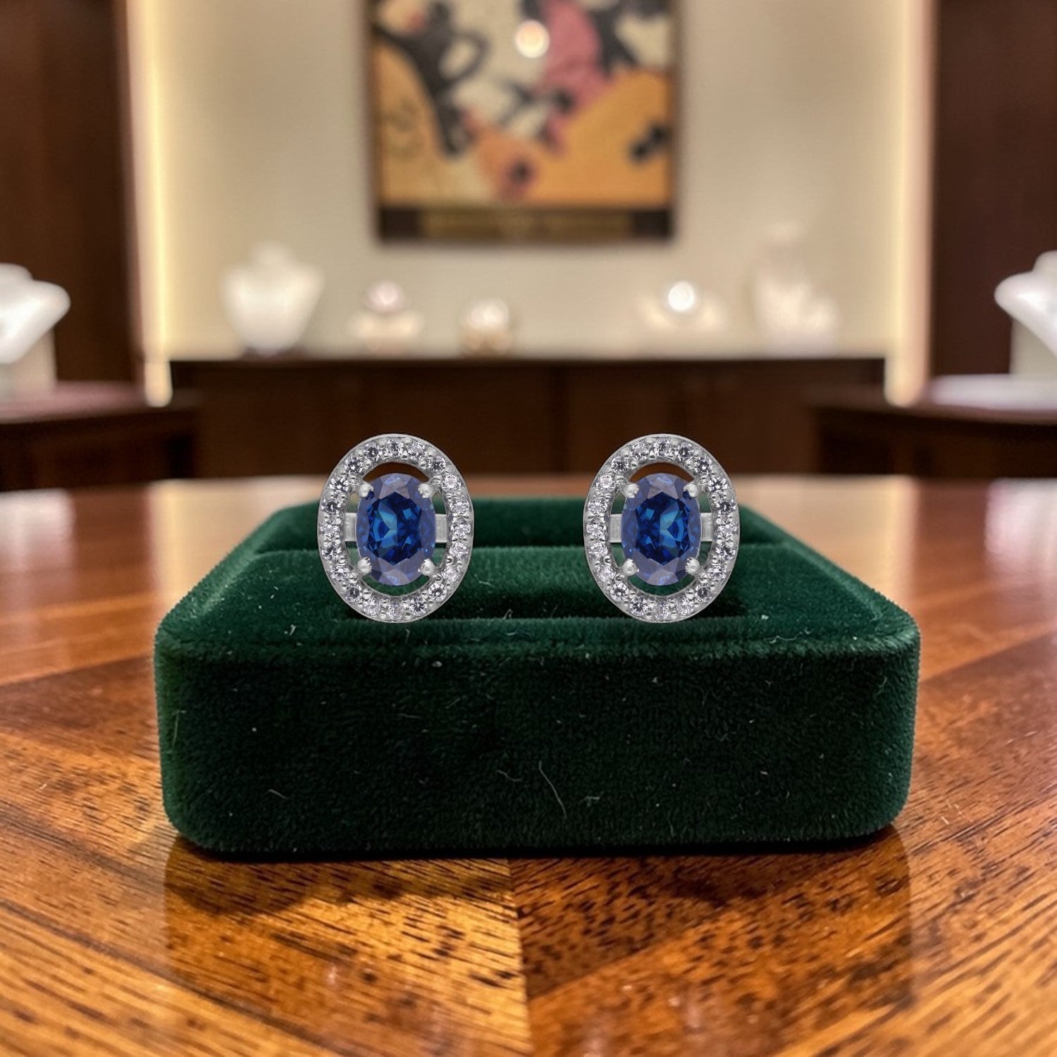 Deep Blue Oval Halo Cubic Zirconia Stud Earrings in Sterling Silver | SKU: 0005750115