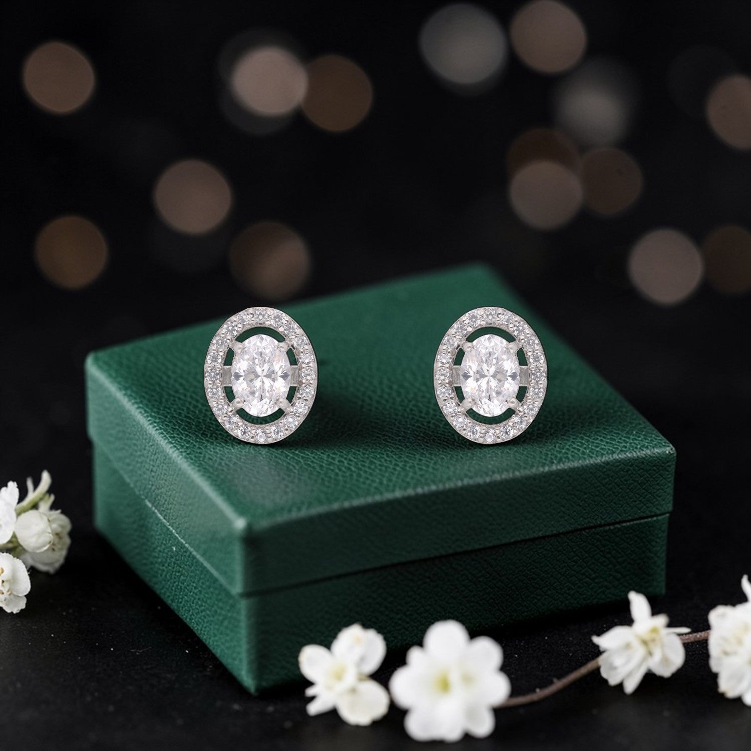 Sterling Silver Oval Cubic Zirconia Halo Stud Earrings | SKU: 0005757565