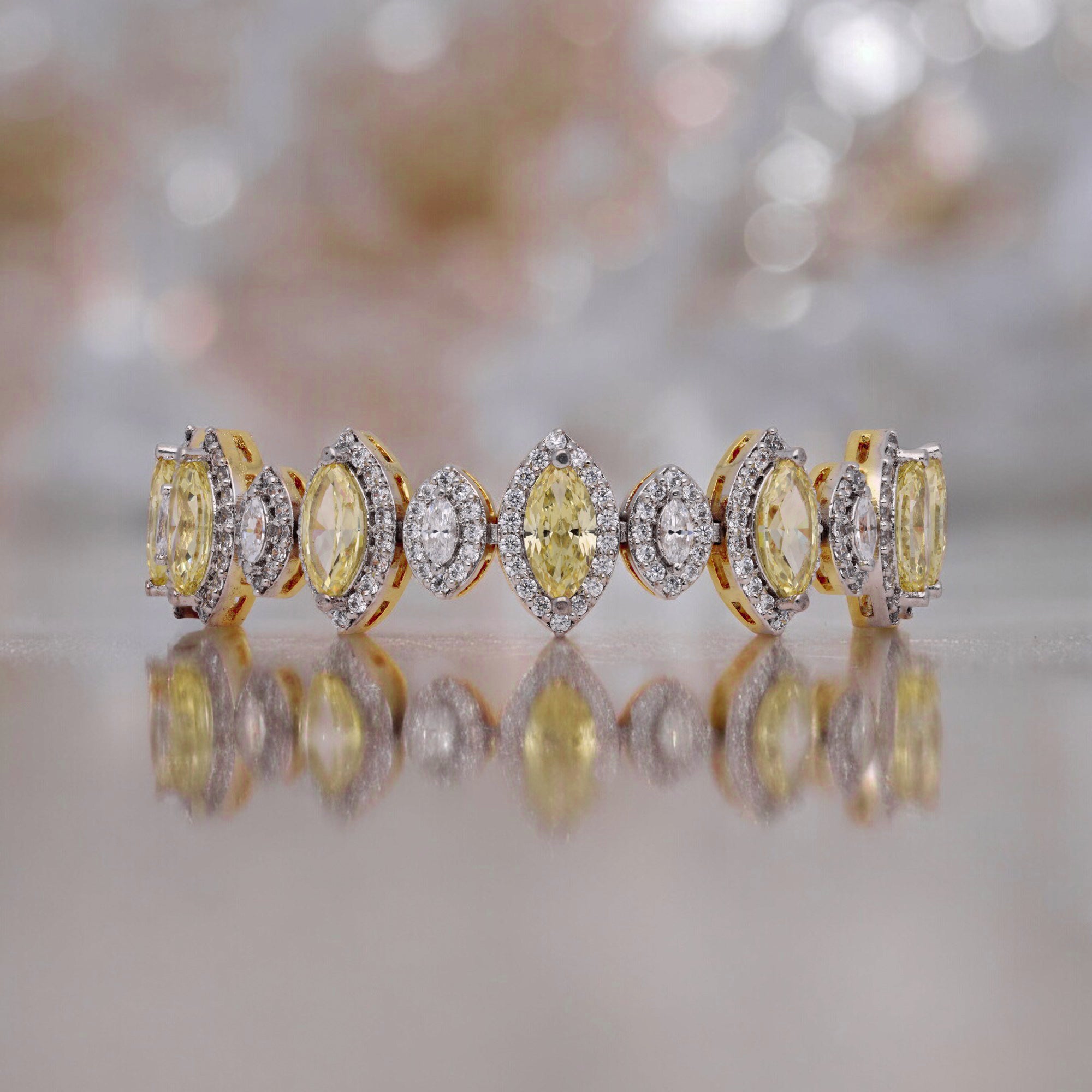 Yellow Gold Finish Sterling Silver Bracelet with Marquise Cubic Zirconia and Yellow Gem Accents | SKU : 0020289843, 0020588694