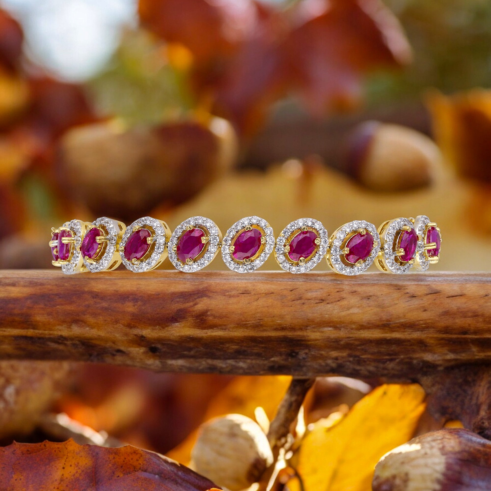 Yellow Gold Finish Sterling Silver Oval Shaped Flexible Bracelet with Red Gem and Cubic Zirconia | SKU : 0020289850, 0020588700