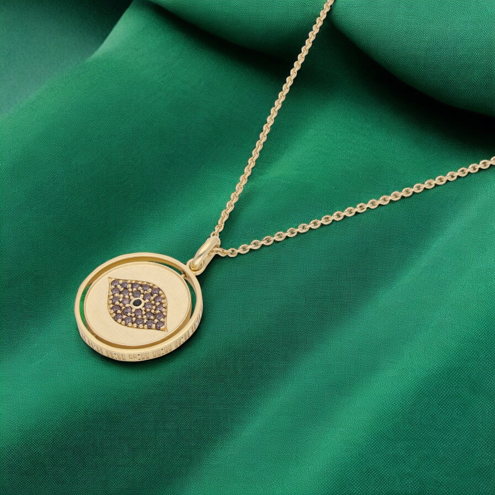 11:11 Gold-Tone Spiritual Evil Eye Silver Pendant with Brown Crystal Accents | SKU : 0020986056, 0003499108, 0021182167, 0021182150, 0021553059, 0021553066