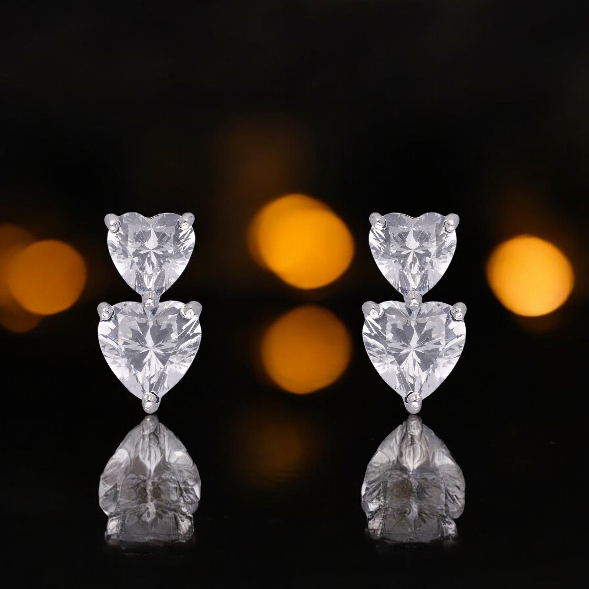 Twin Flame Heart-Cut Stud Earrings in Silver Tone | SKU : 0021327742