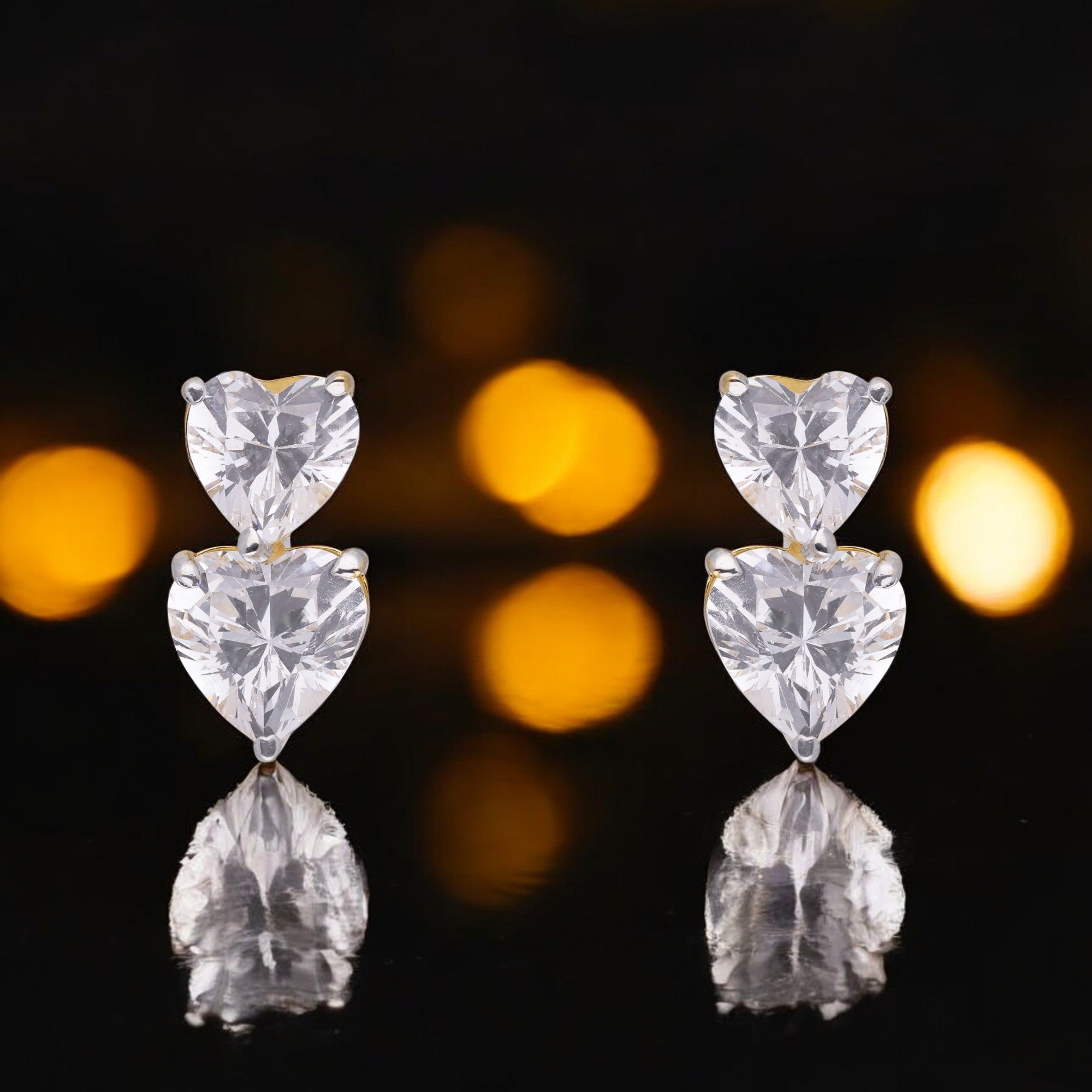 Twin Flame Heart-Cut Stud Earrings in Radiant Gold Tone | SKU : 0021327766