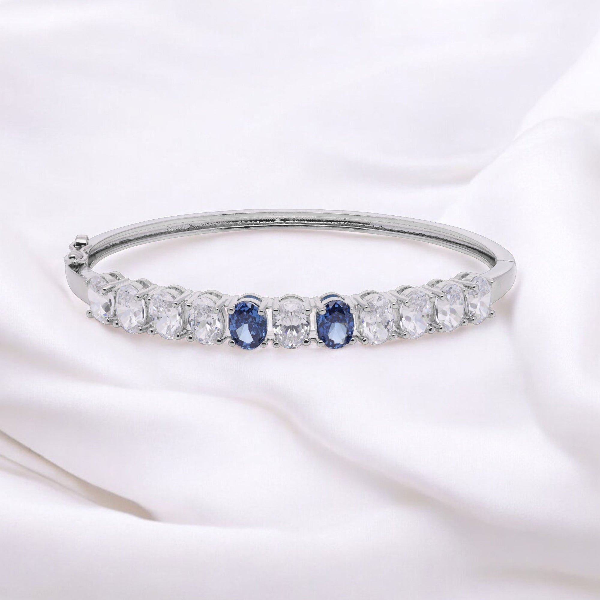 Blue and White Oval-Cut Stone Bangle in Silver Tone | SKU: 0021423635