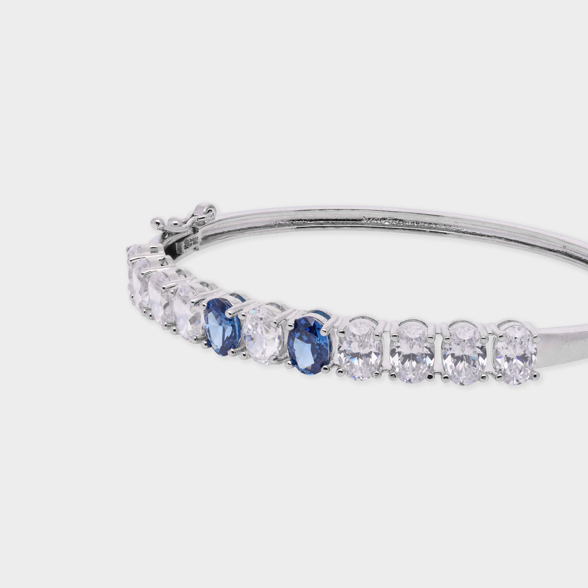 Blue and White Oval-Cut Stone Bangle in Silver Tone | SKU: 0021423635