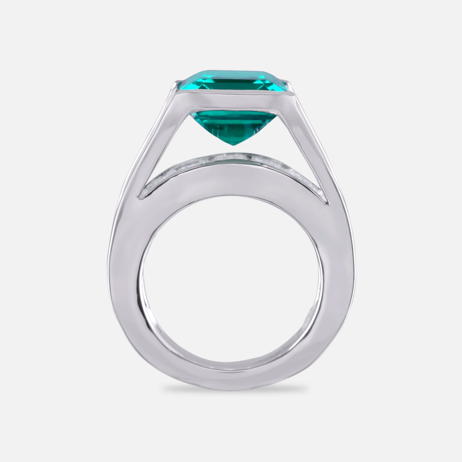 Emerald-Cut Green Stone Statement Ring with Baguette Accents in White Gold Finish | SKU : 0021474224