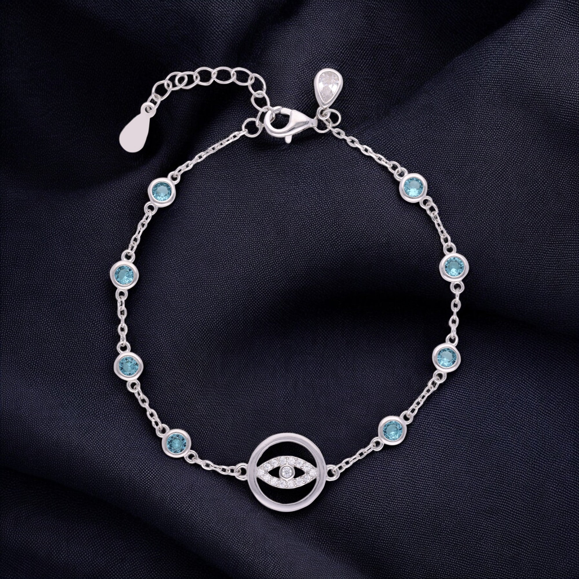 Dazzling Evil Eye Bracelet with Blue Crystal Stations in Silver and Rose Finish | SKU : 0021546044, 0021546051, 0021546068, 0021546037