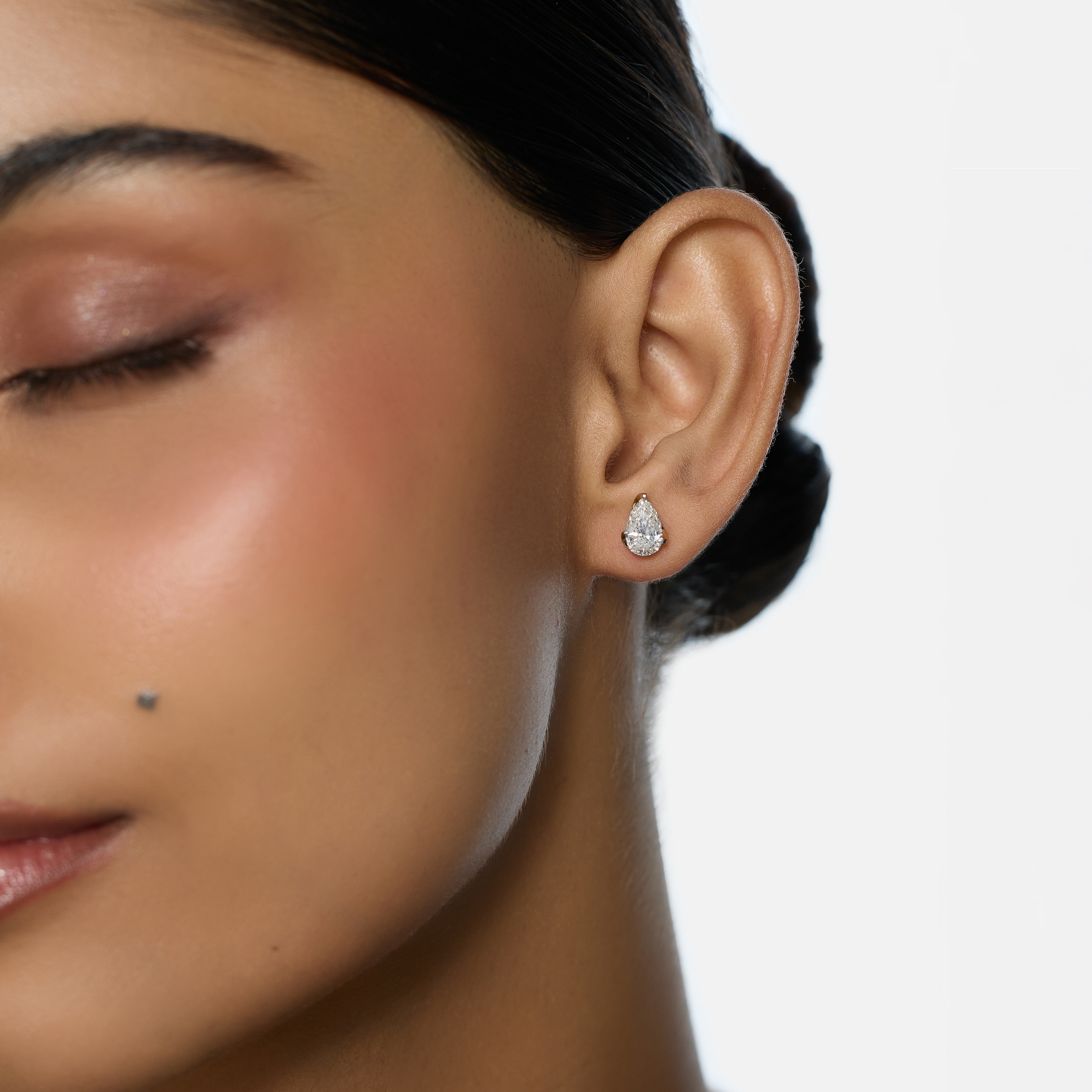 Gold Stud Earrings with Pear Step-Cut Lab-Grown Diamonds in Sculpted Wrap Setting | SKU : 0021916397