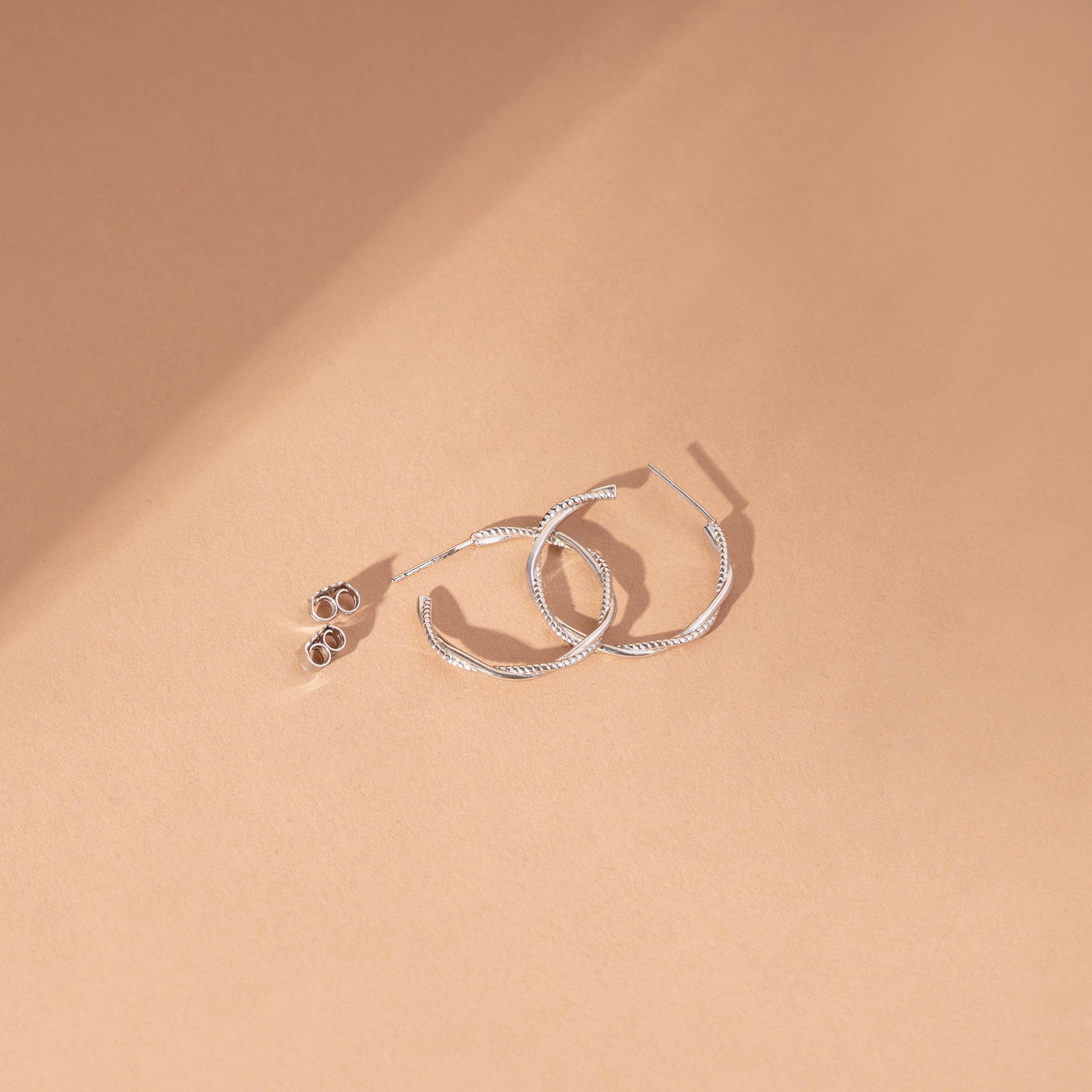 " Swirled sterling silver hoop- Crash Club by CKC"