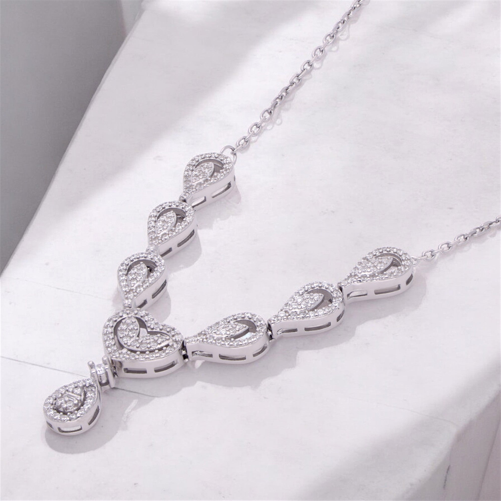 CELESTIAL CASCADE: STERLING SILVER DOUBLE HOOK CHAIN PENDANT | SKU : 0003113882, 0003113943, 0003113967