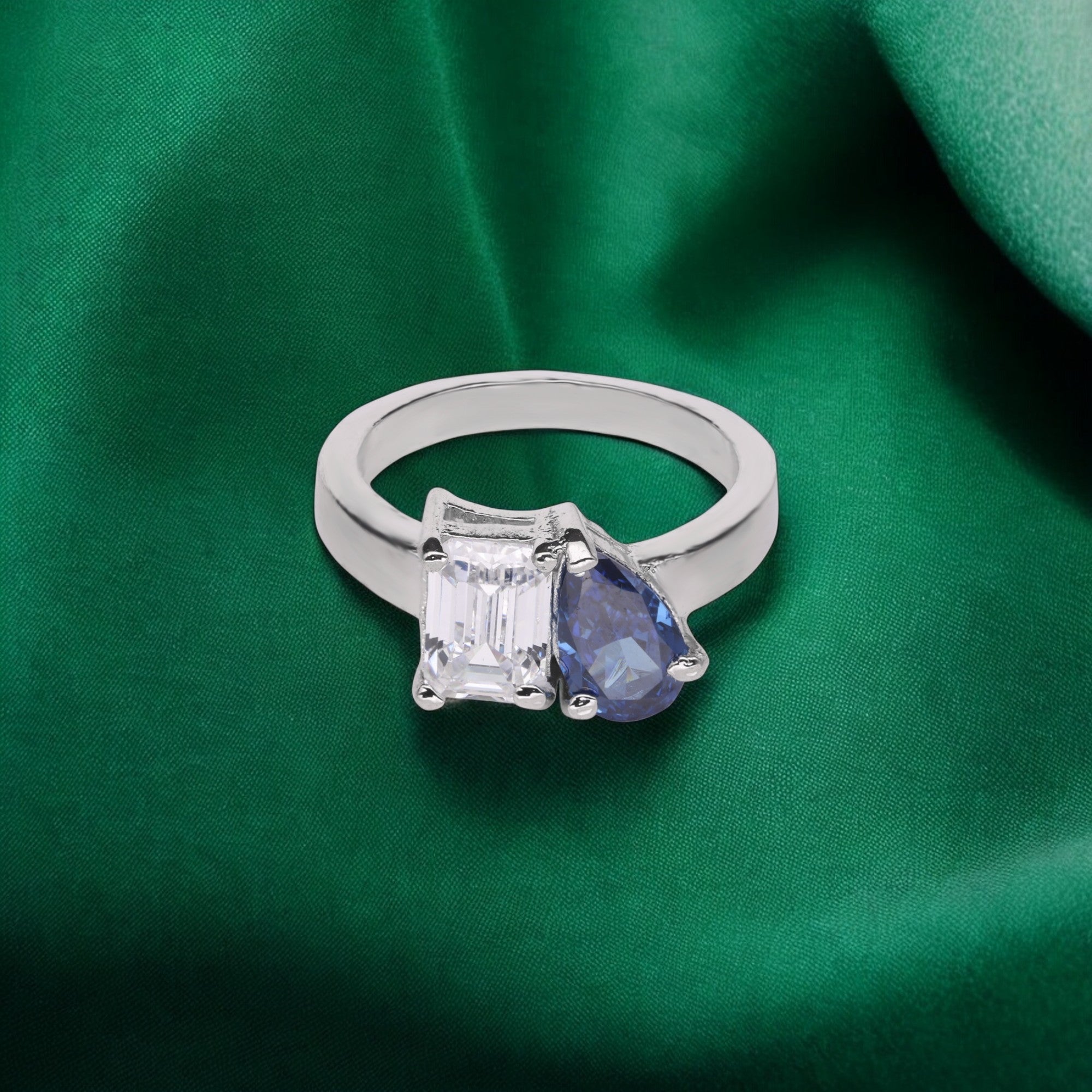 Blue Gemstone Ring Encircled with Sparkling Accents | SKU : 0003395141, 0020809973, 0020809980, 0003395158