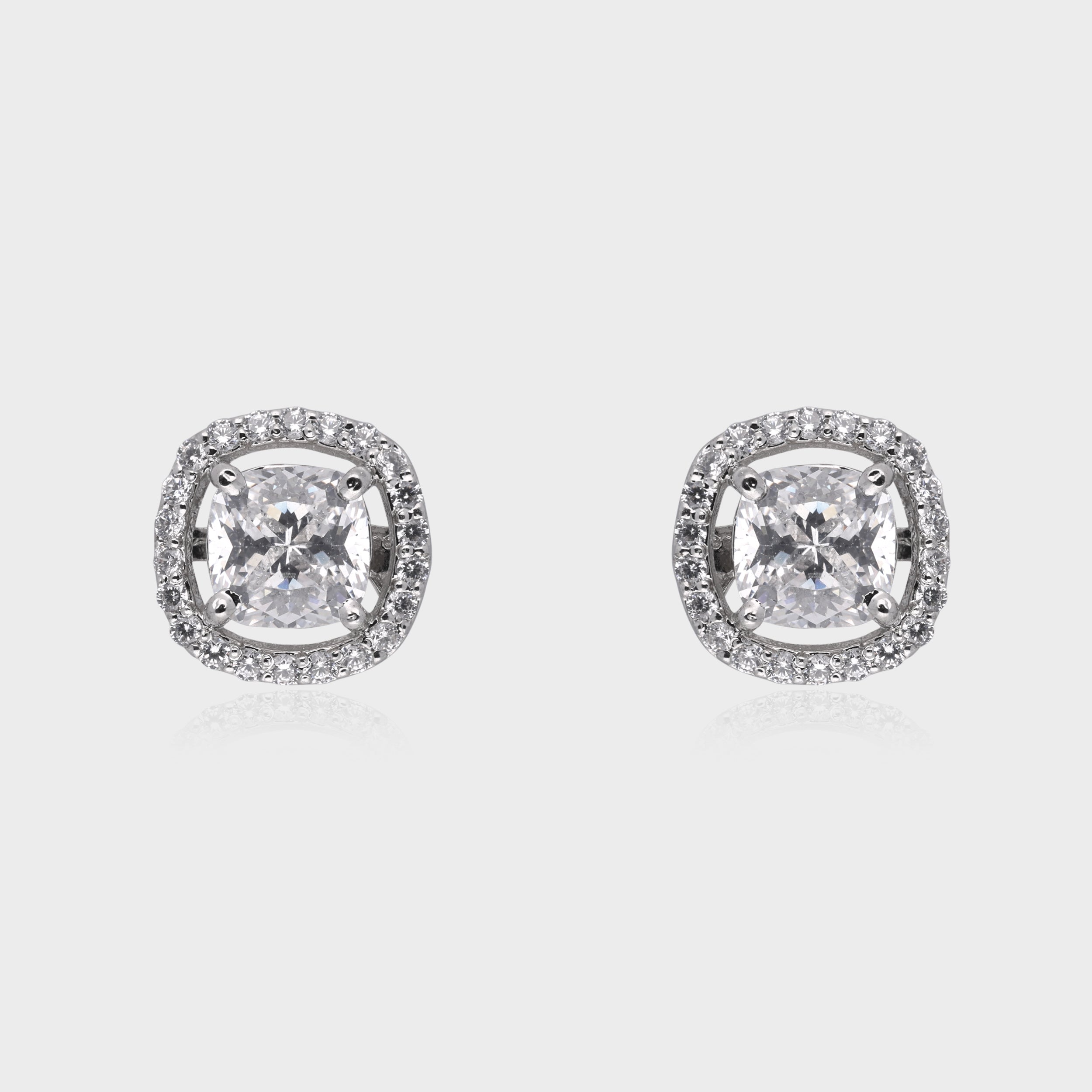 Regal Brilliance: Cushion-Cut White Gemstone Halo Stud Earrings in Sterling Silver | SKU : 0003534939