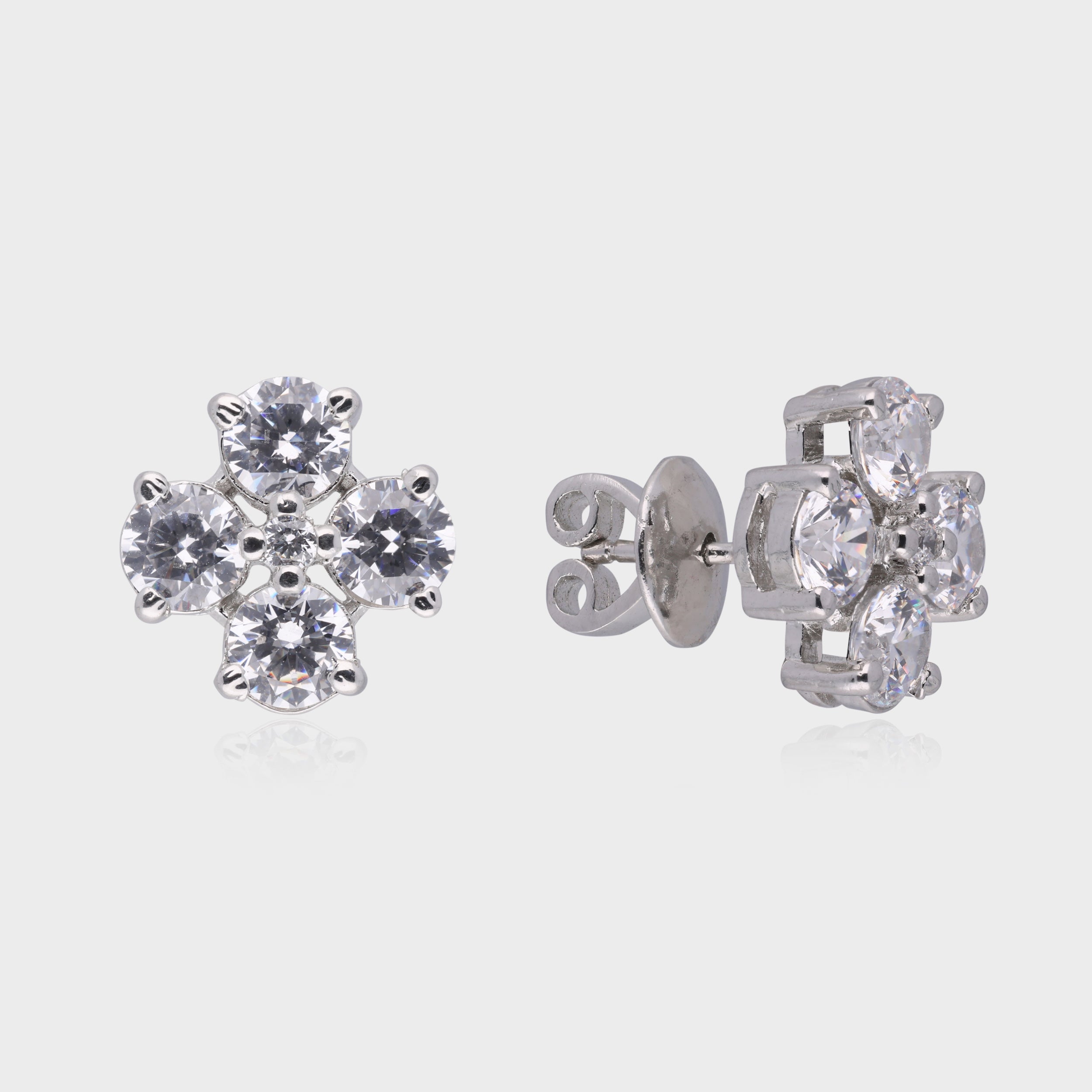 Radiant Bloom: Round-Cut White Gemstone Floral Stud Earrings in Sterling Silver | SKU : 0003534991, 0021326769, 0021326776