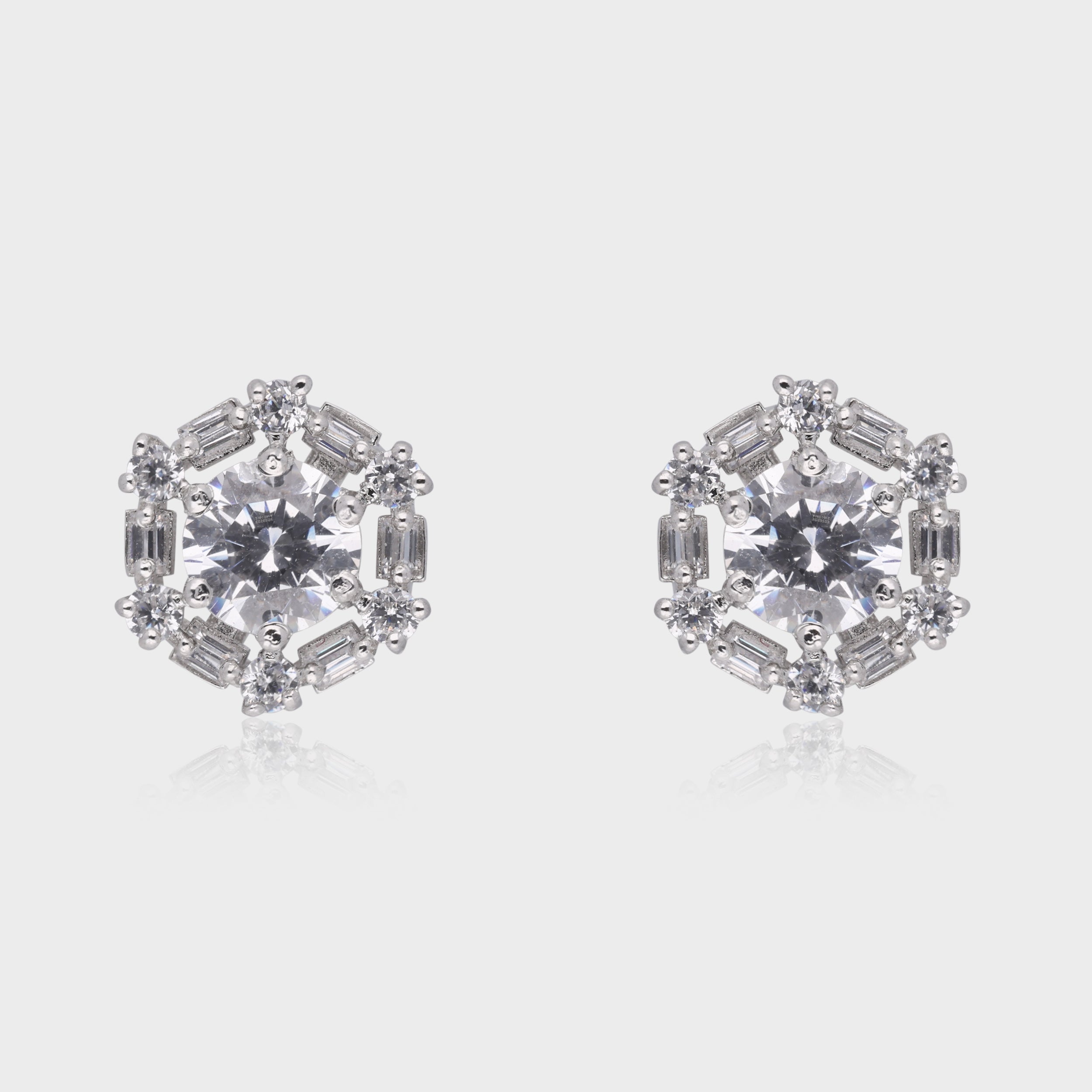 Regal Illusion: Round & Baguette-Cut White Gemstone Halo Stud Earrings in Sterling Silver | SKU : 0003535080, 0021327056, 0021327063