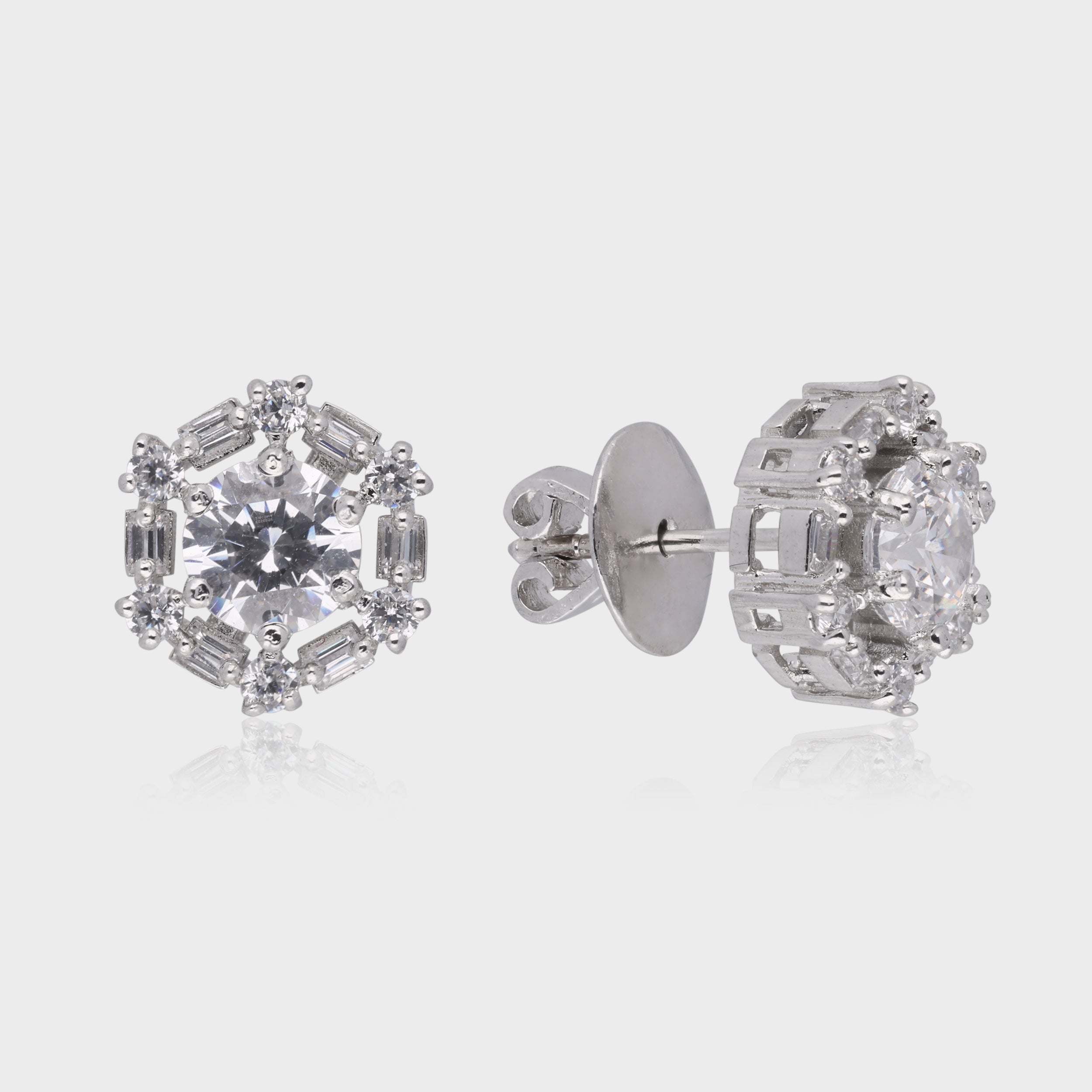 Regal Illusion: Round & Baguette-Cut White Gemstone Halo Stud Earrings in Sterling Silver | SKU : 0003535080, 0021327056, 0021327063