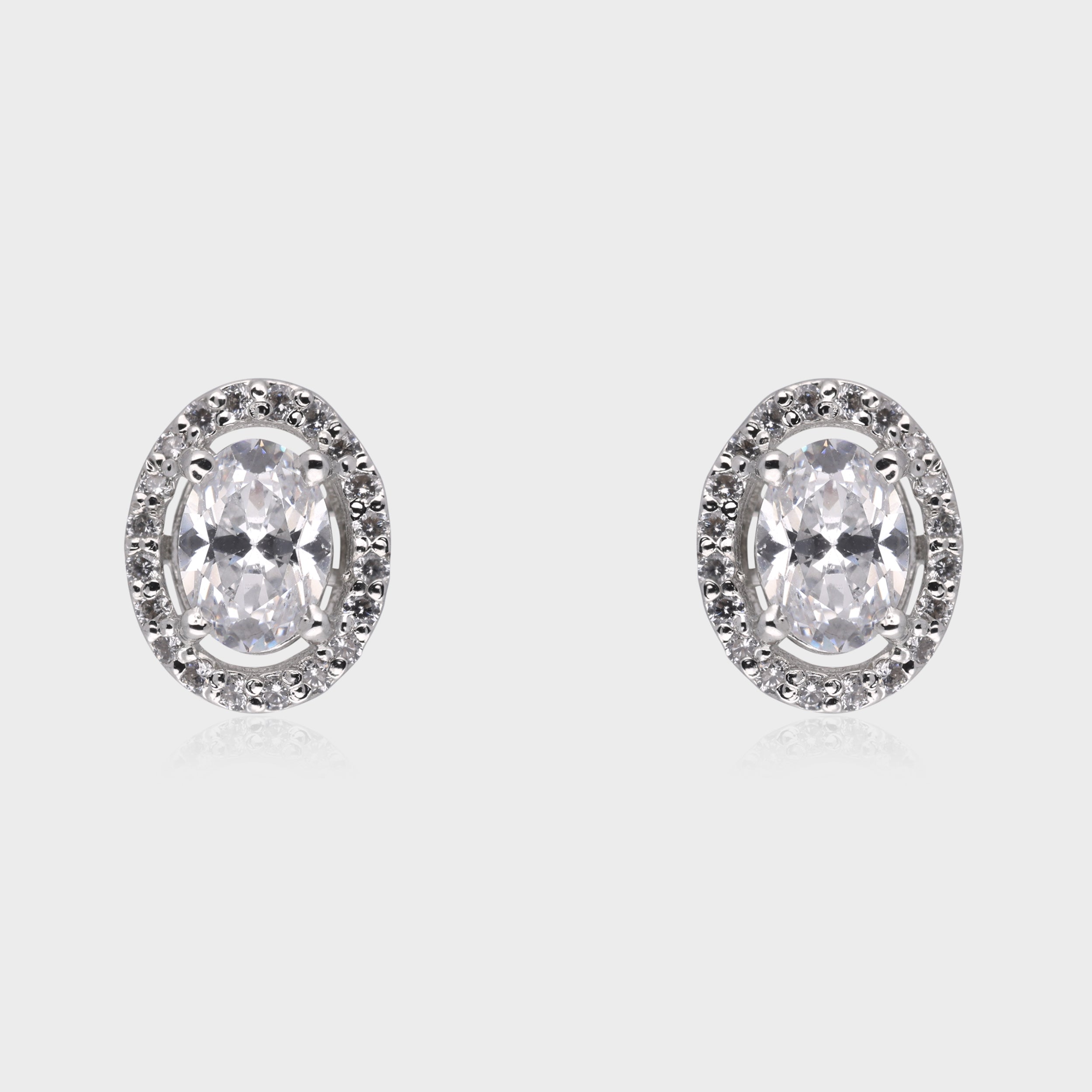 Timeless Radiance: Oval-Cut White Gemstone Halo Stud Earrings in Sterling Silver | SKU : 0003535110, 0021327124, 0021327131