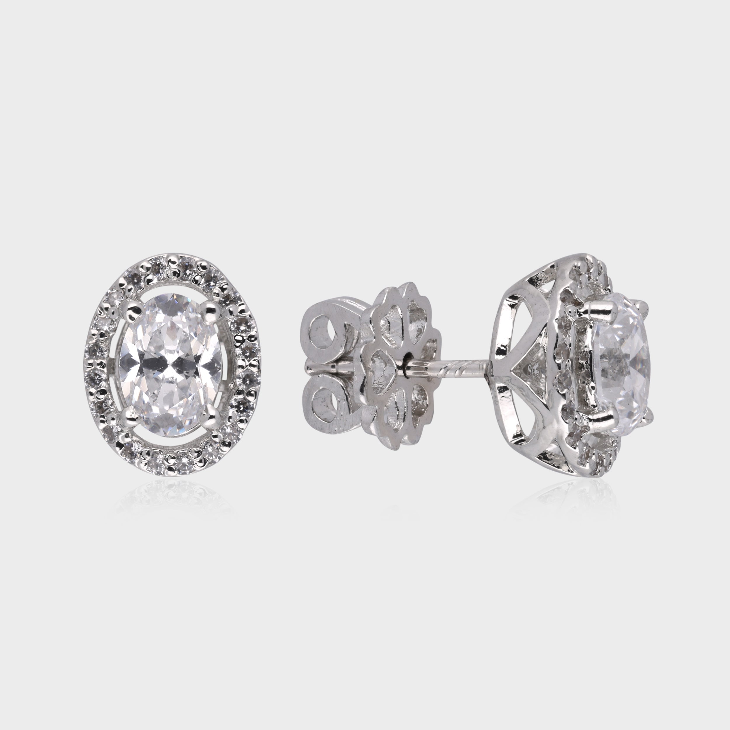 Timeless Radiance: Oval-Cut White Gemstone Halo Stud Earrings in Sterling Silver | SKU : 0003535110, 0021327124, 0021327131