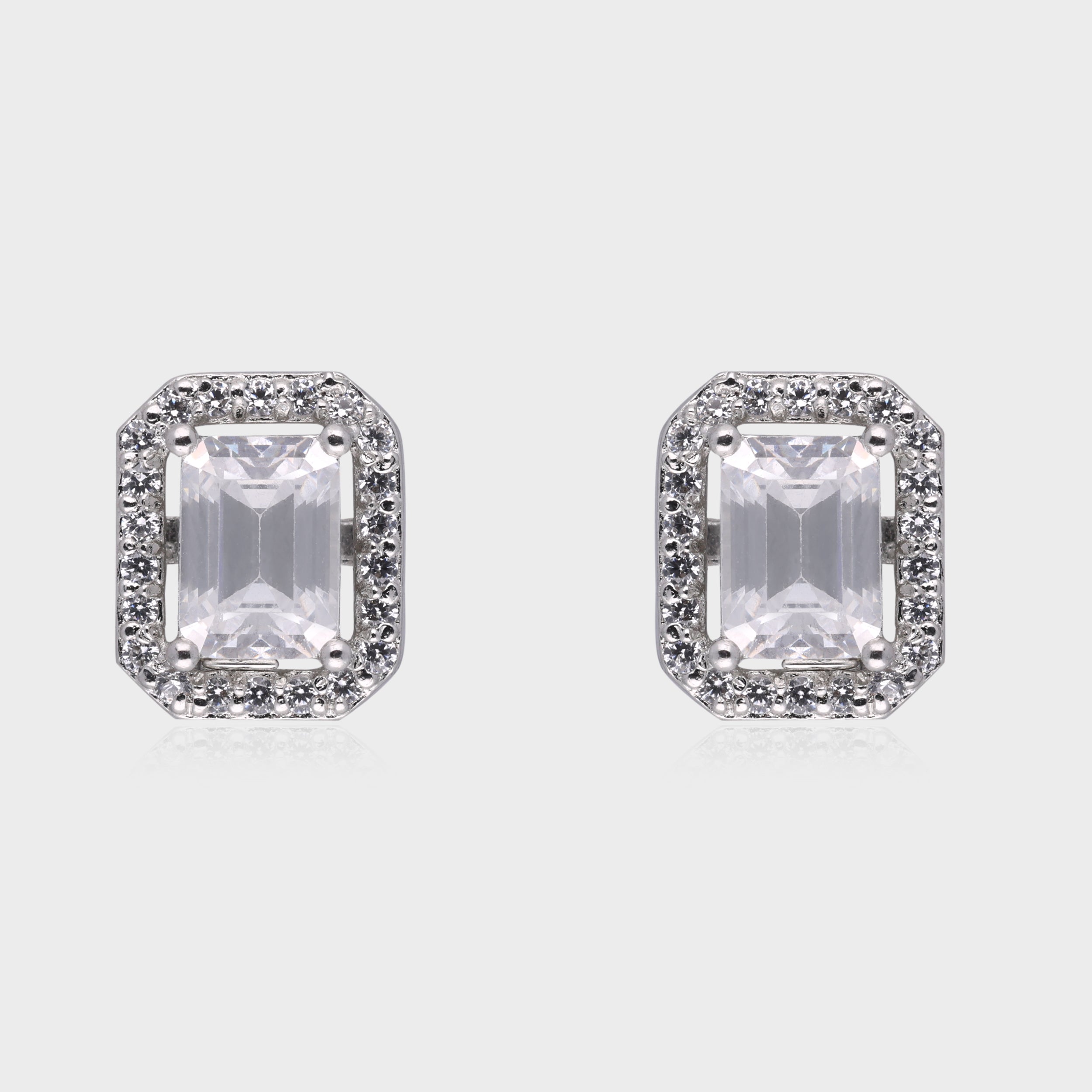 Regal Brilliance: Emerald-Cut White Gemstone Halo Stud Earrings in Sterling Silver | SKU : 0003535127, 0021327148, 0021327155