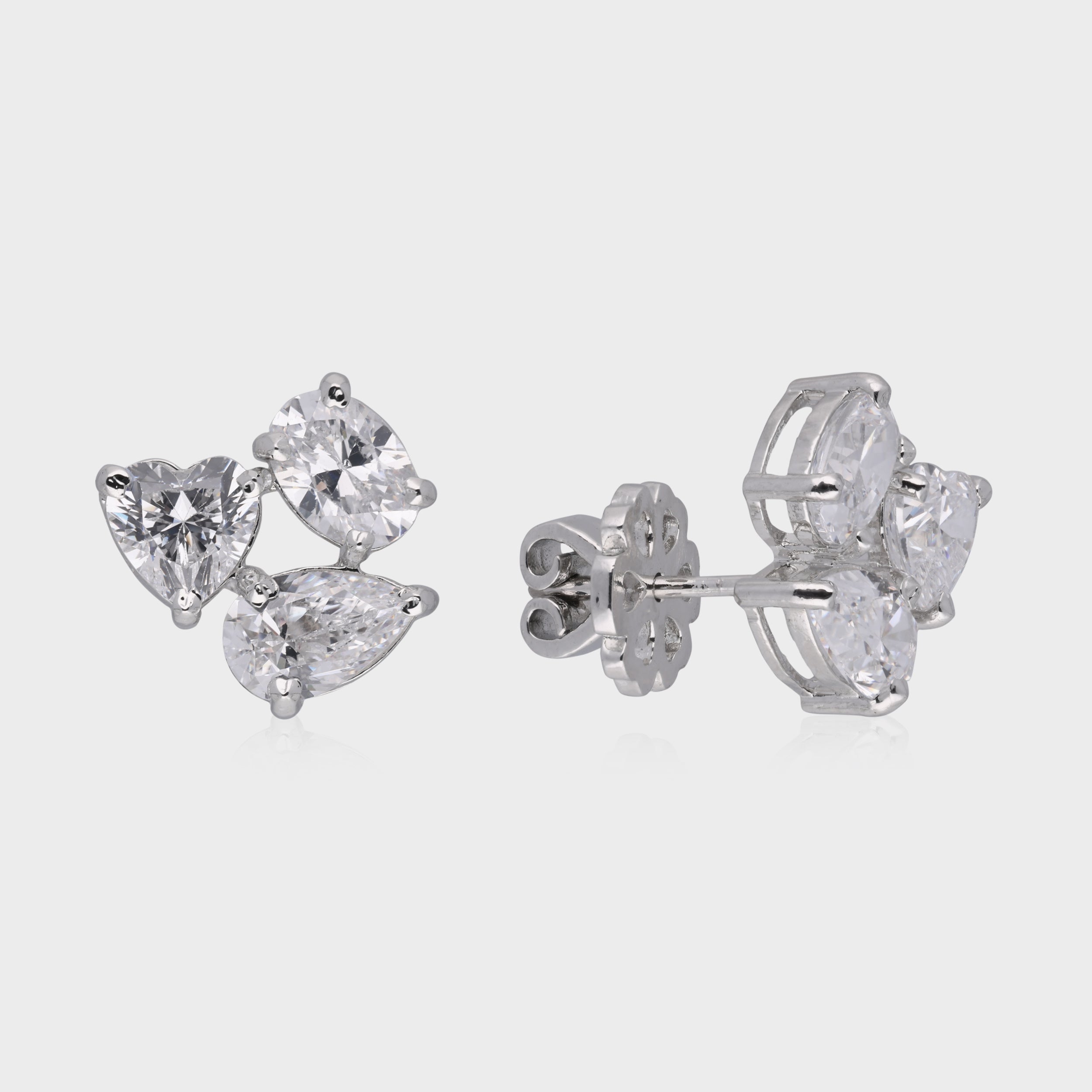 Radiant Harmony: Multi-Cut White Gemstone Cluster Stud Earrings in Sterling Silver | SKU : 0003535134, 0021327162, 0021327179