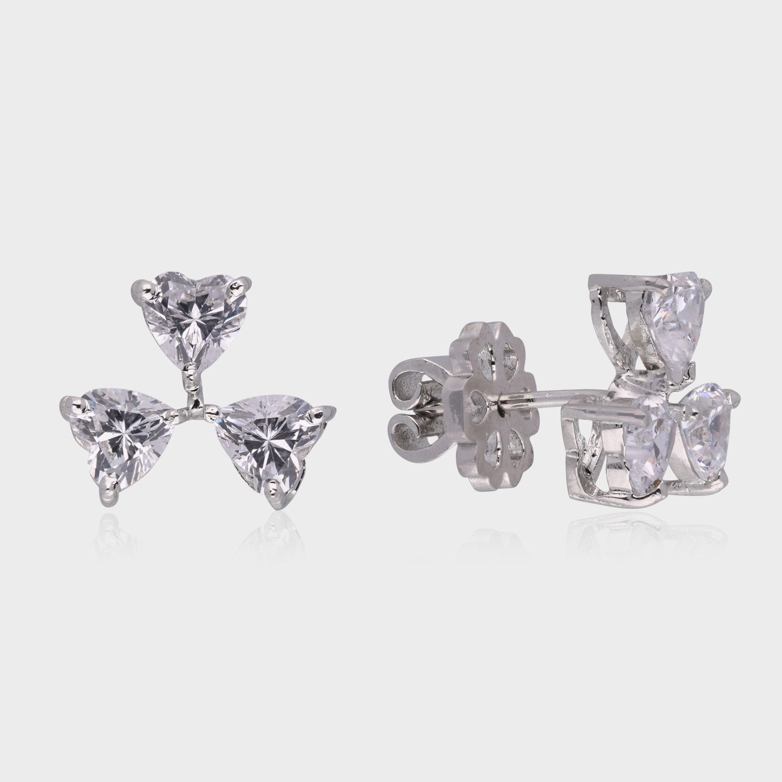 Trilliant Bloom: Heart-Cut White Gemstone Cluster Stud Earrings in Sterling Silver | SKU : 0003535141, 0021327186, 0021327193