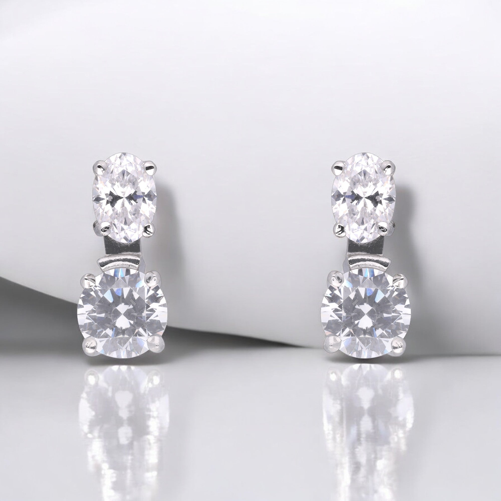 Classic Two-Stone Oval & Round Cubic Zirconia Silver Stud Earrings| SKU : 0003535196, 0021327285, 0021327292