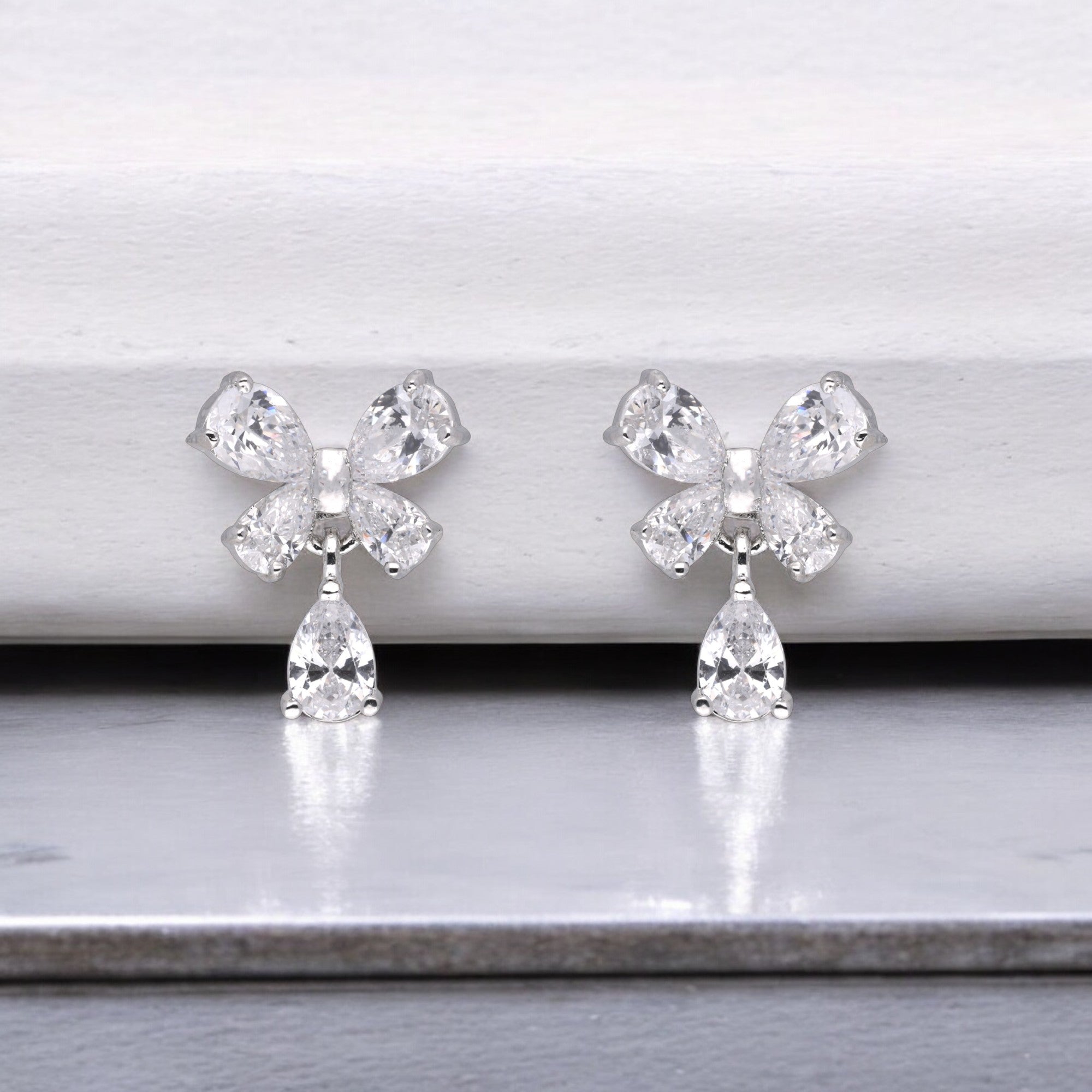 Butterfly-Inspired Cubic Zirconia Drop Earrings in Silver | SKU : 0003535219, 0021327339, 0021327322