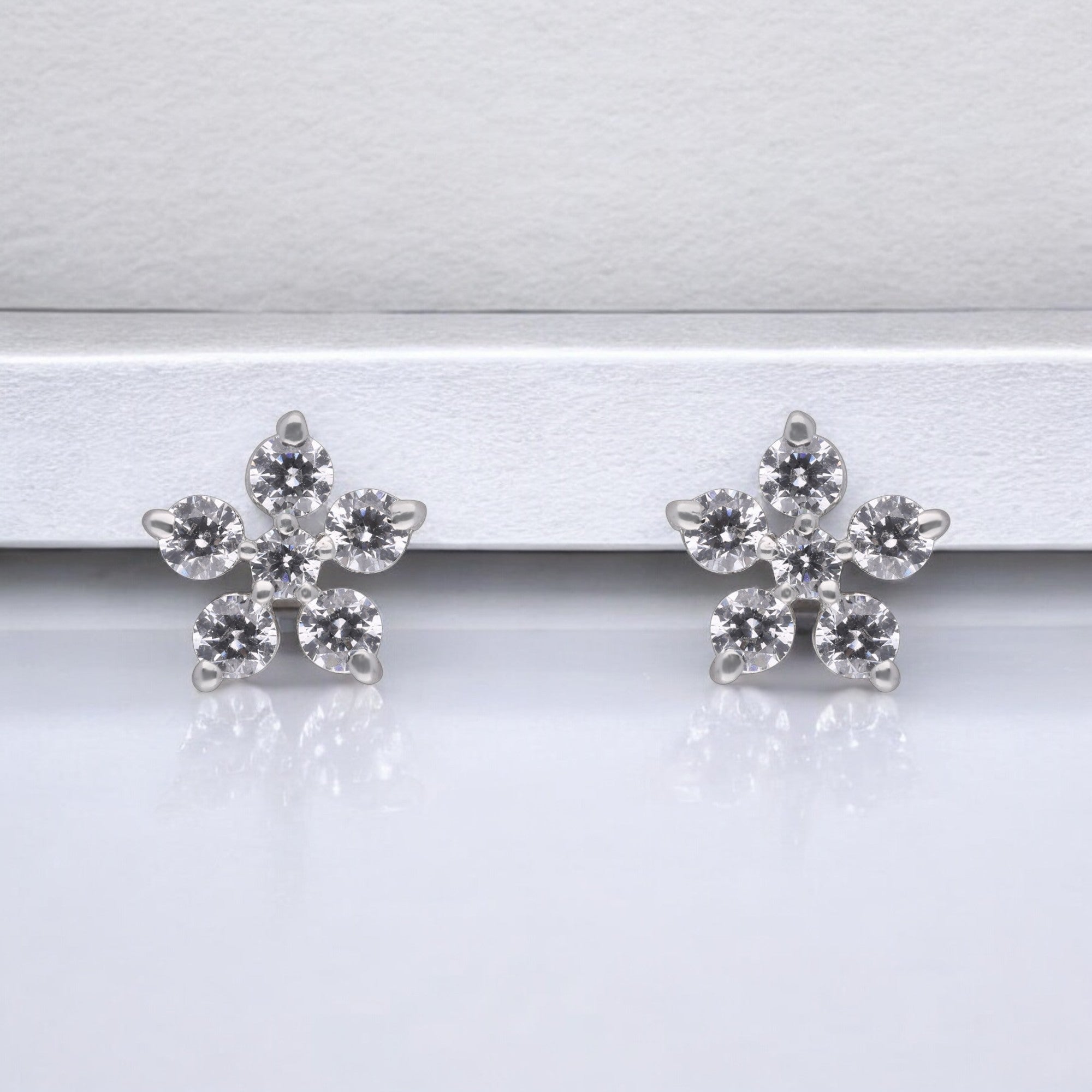 Dazzling Floral Diamond Stud Earrings in Silver| SKU : 0003535271, 0021327452, 0021327469