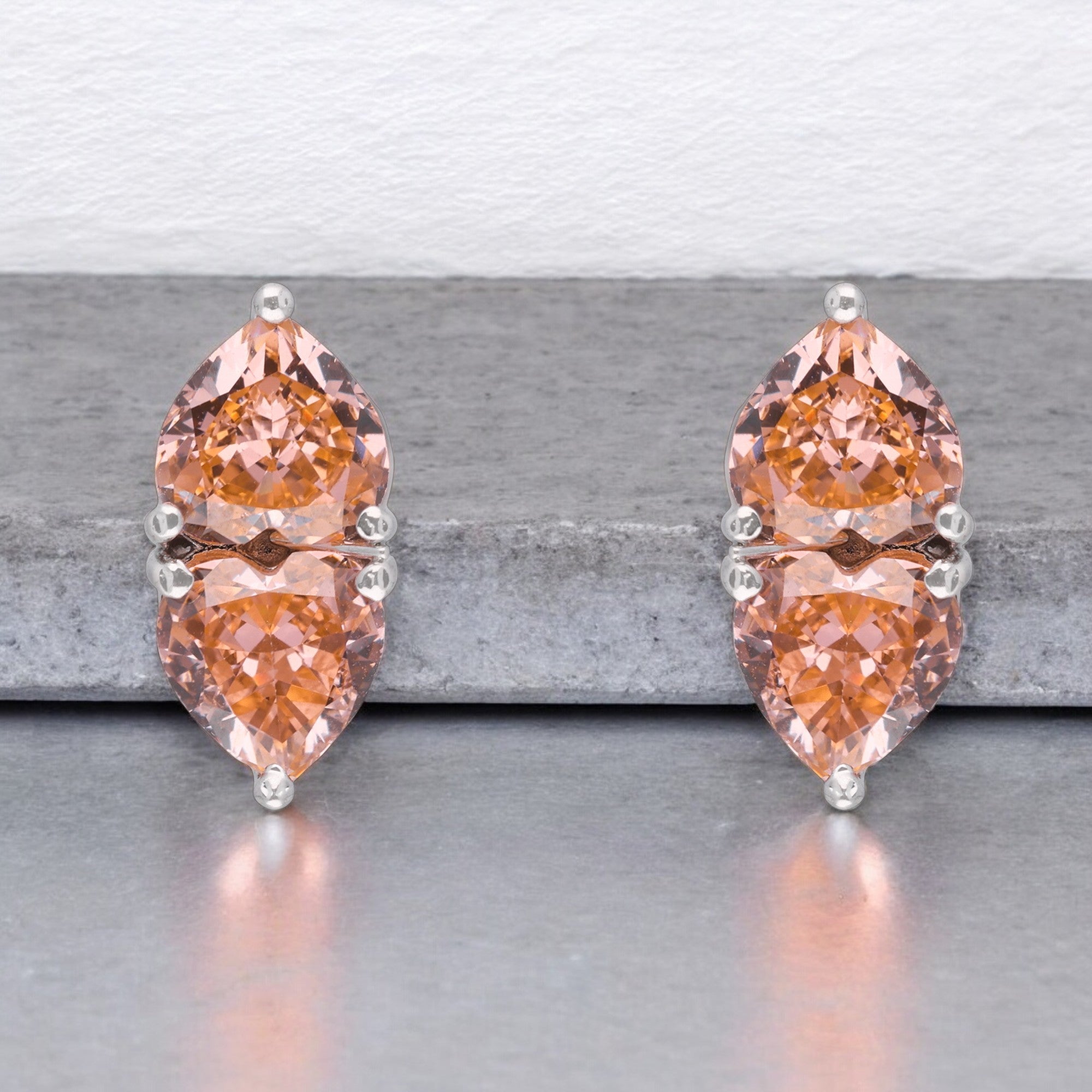 Elegant Silver Stud Earrings with Dual Peach-Toned Pear-Cut Stones | SKU : 0003594278, 0021455933, 0021455889