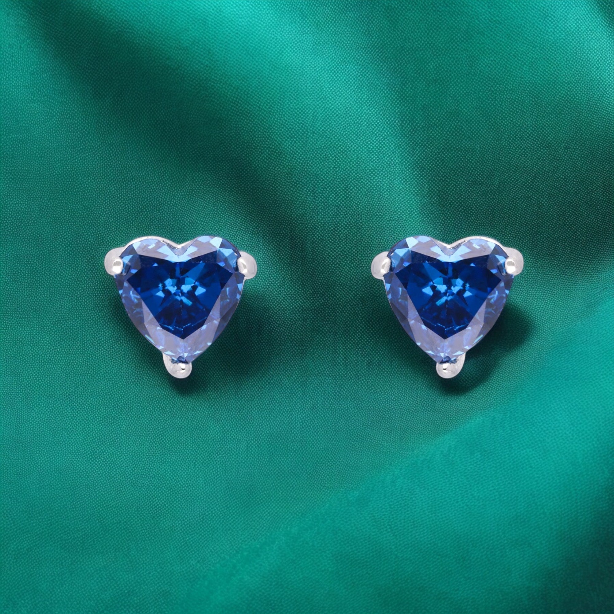 Silver Heart-Shaped Blue Stone Stud Earrings | SKU : 0003594322, 0021456039, 0021456022, 0021456015