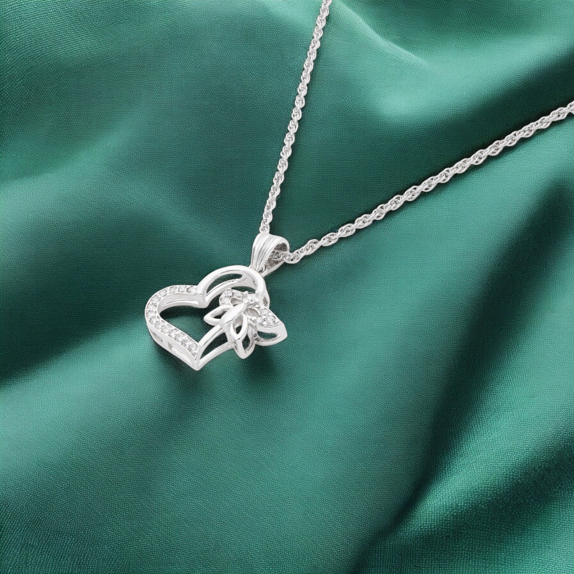 Silver Heart Pendant Necklace with Delicate Bow Accent | SKU : 0003594490, 0003594469, 0021456442, 0021456459