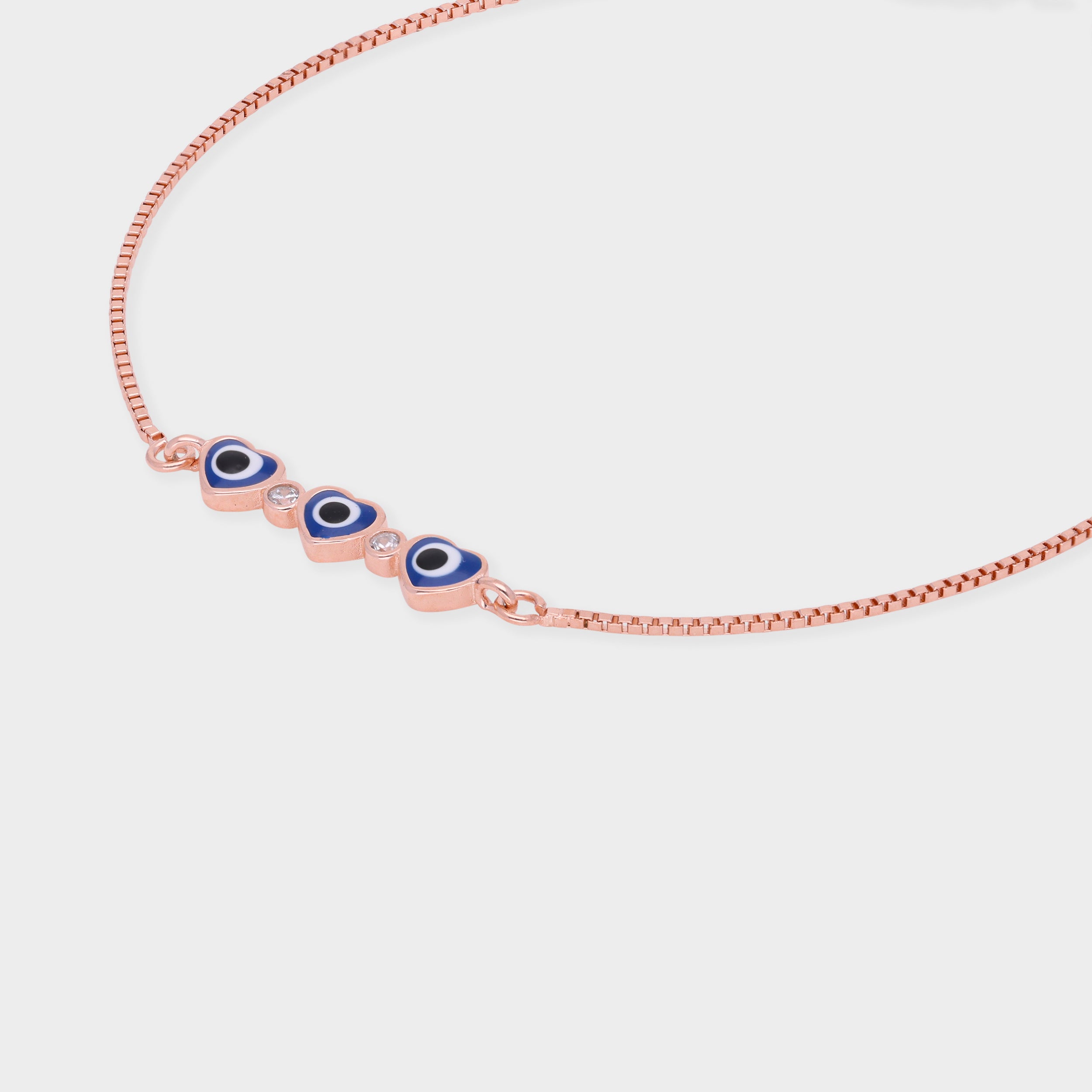 Rose Gold Tone Heart Evil Eye Bracelet with Blue Enamel Accents | SKU : 0003624180, 0021525568, 0021525575
