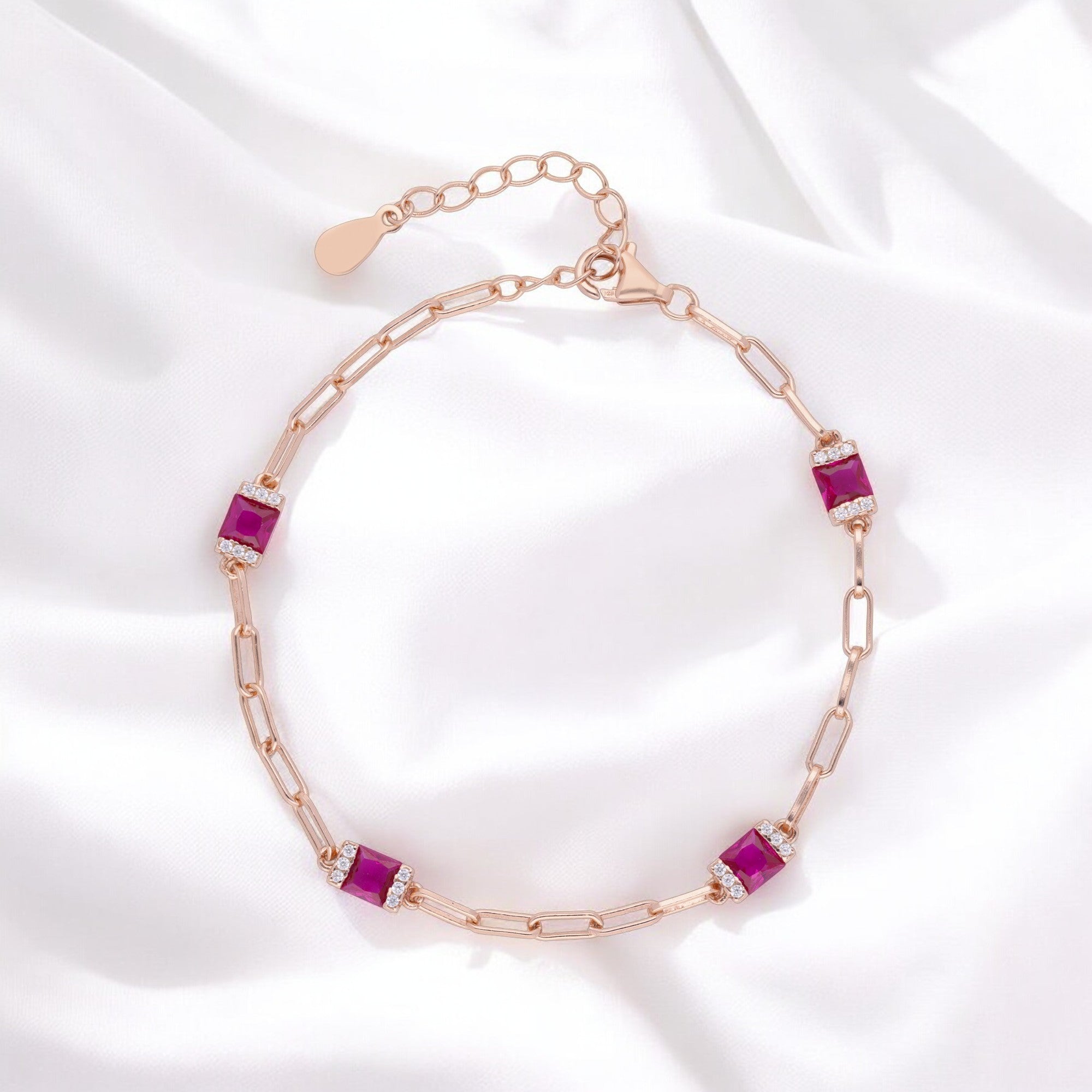 Rose-Tone Paperclip Chain Bracelet with Bold Red Stone Stations | SKU : 0021546747, 0003631096, 0021546754, 0021546761