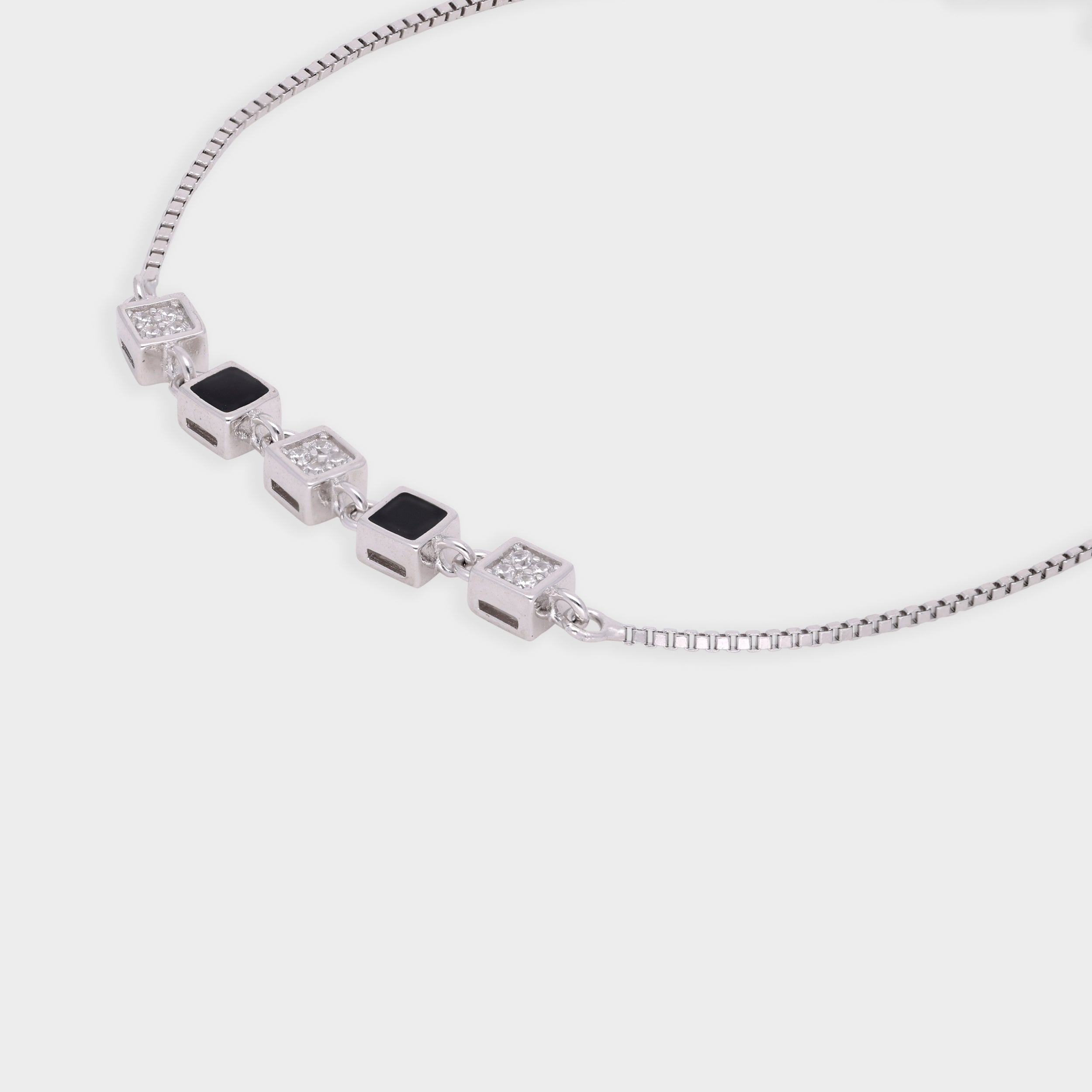 Geometric Square Bracelet with Black Enamel and Sparkling Stones in Silver and Rosegold | SKU : 0021546716, 0021546730, 0021546723, 0003631102