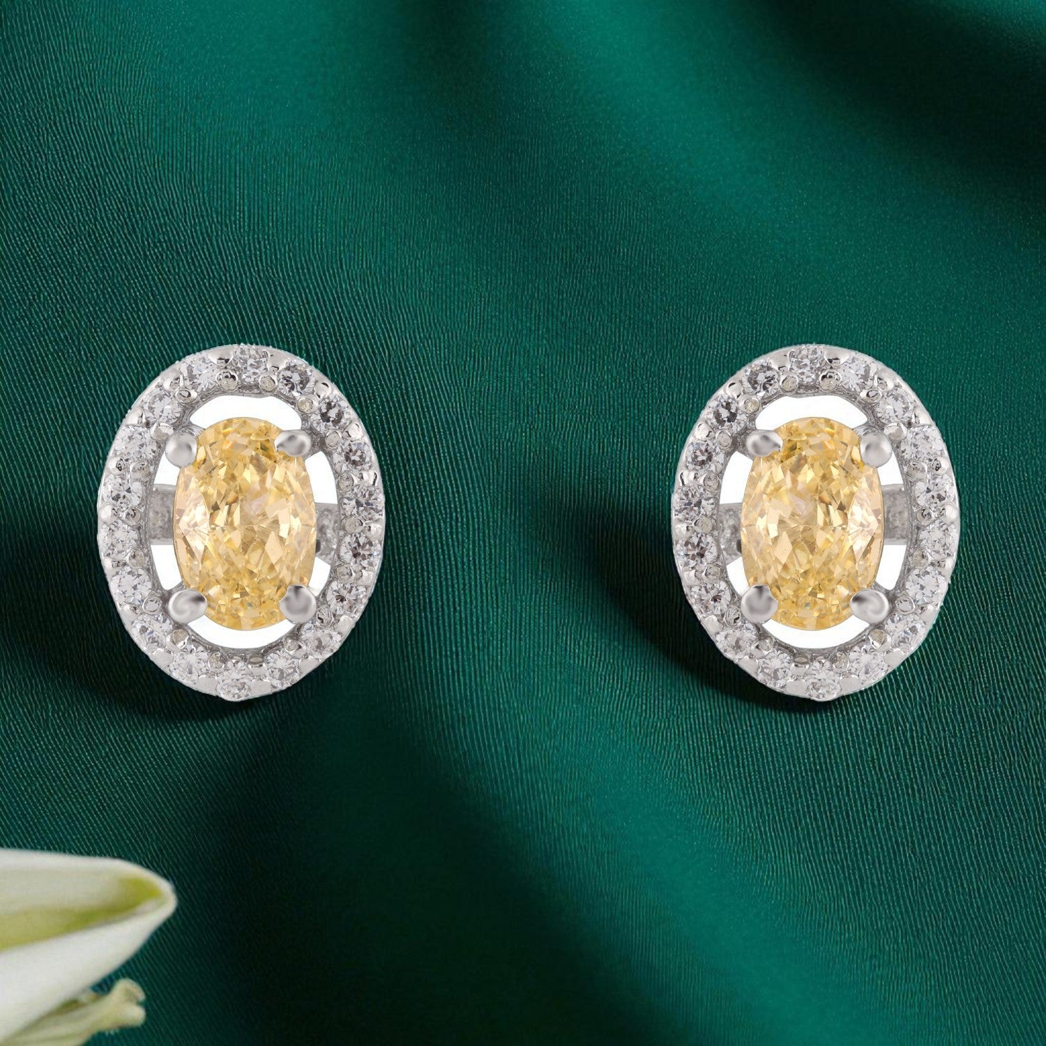 Radiant Yellow Oval Halo Sterling Silver Stud Earrings | SKU : 0022260758, 0022259578, 0003939147
