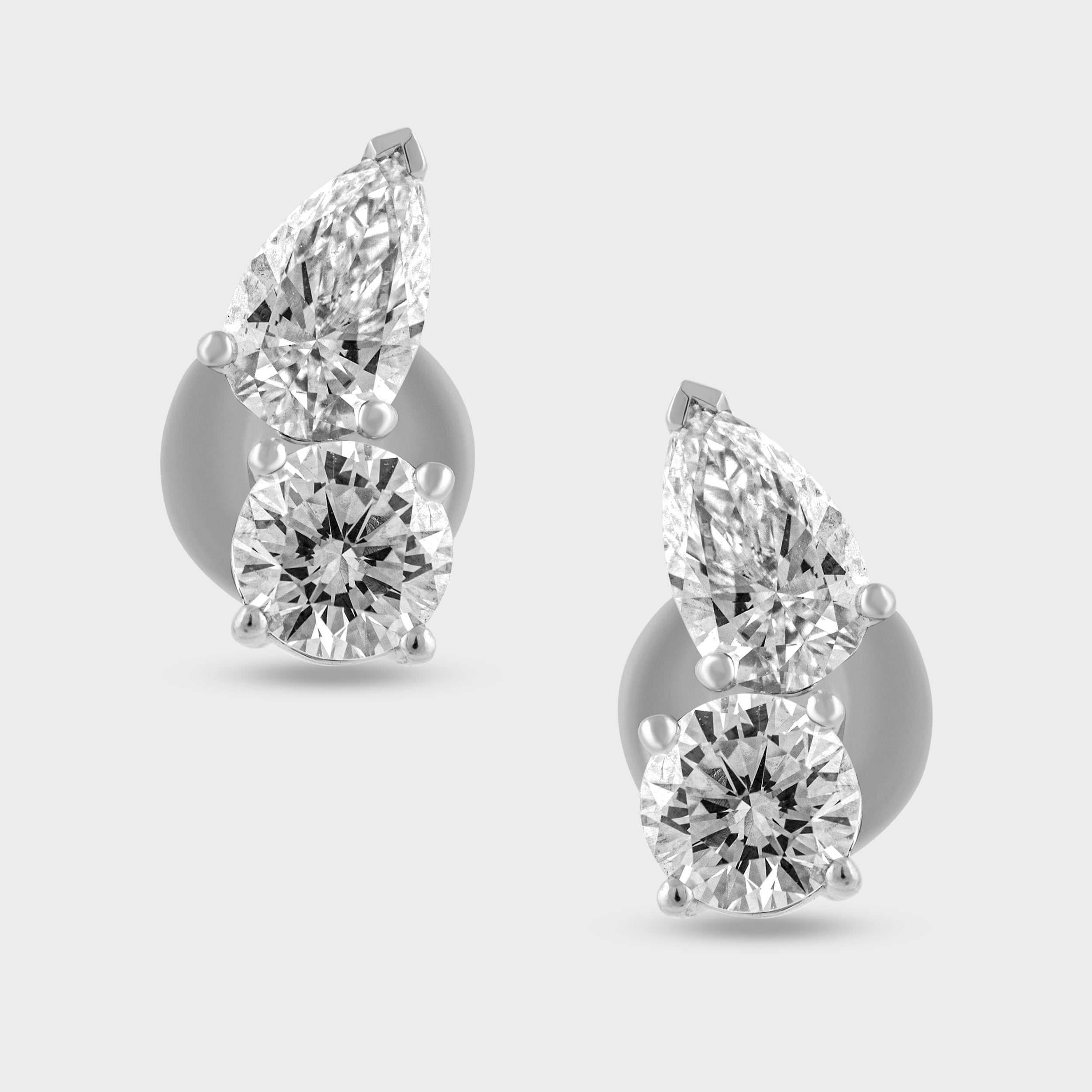 Pear Shaped 0.66 Carat and Round Brilliant 0.63 Carat Lab Grown Solitaire Diamond White Gold 18K Ear Studs | SKU : 0020602178