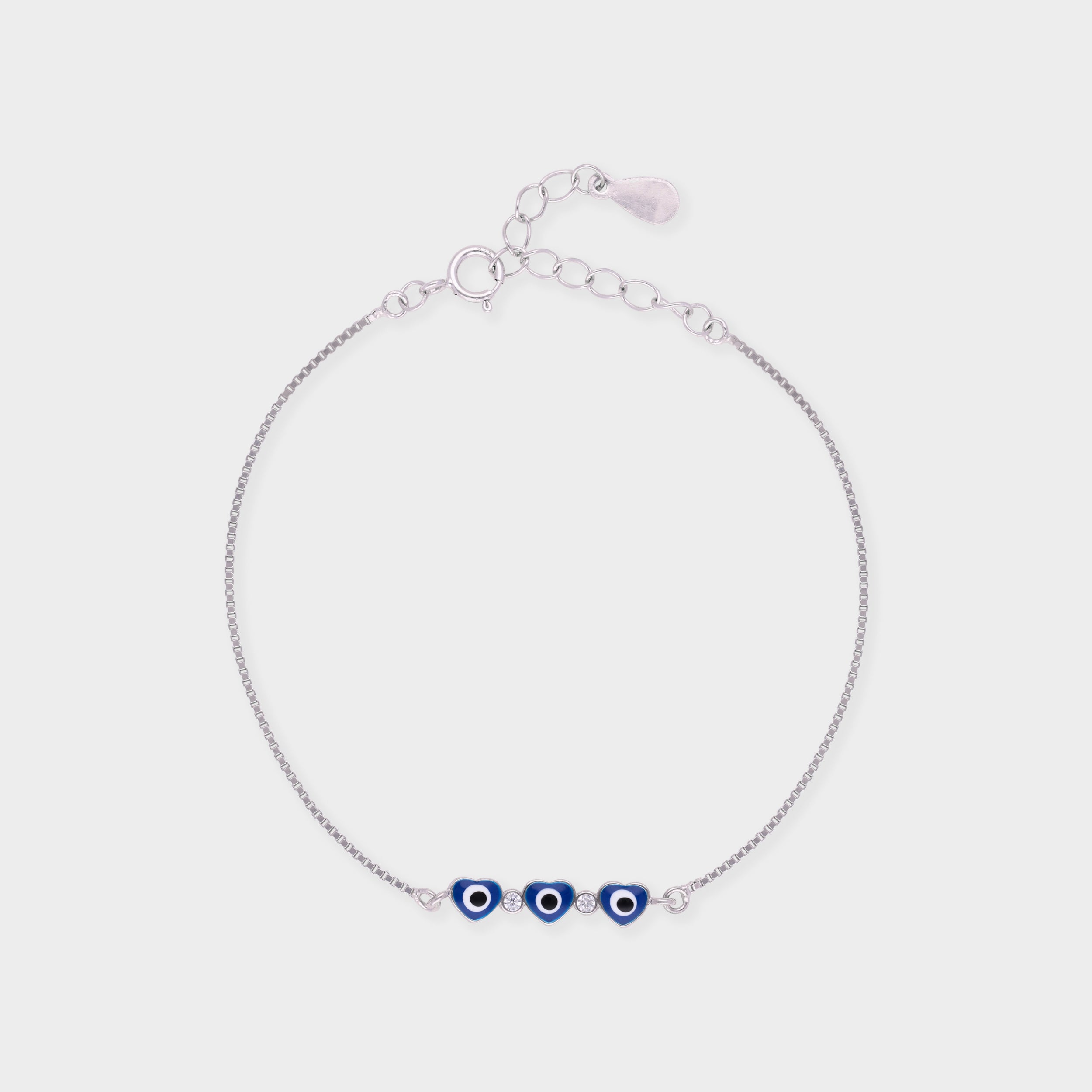 Silver Tone Heart Evil Eye Bracelet with Blue Enamel Accents | SKU : 0021525551, 0021525544, 0021525537, 0021525520, 0003624197, 0021546204, 0021546198, 0021546211, 0021546228