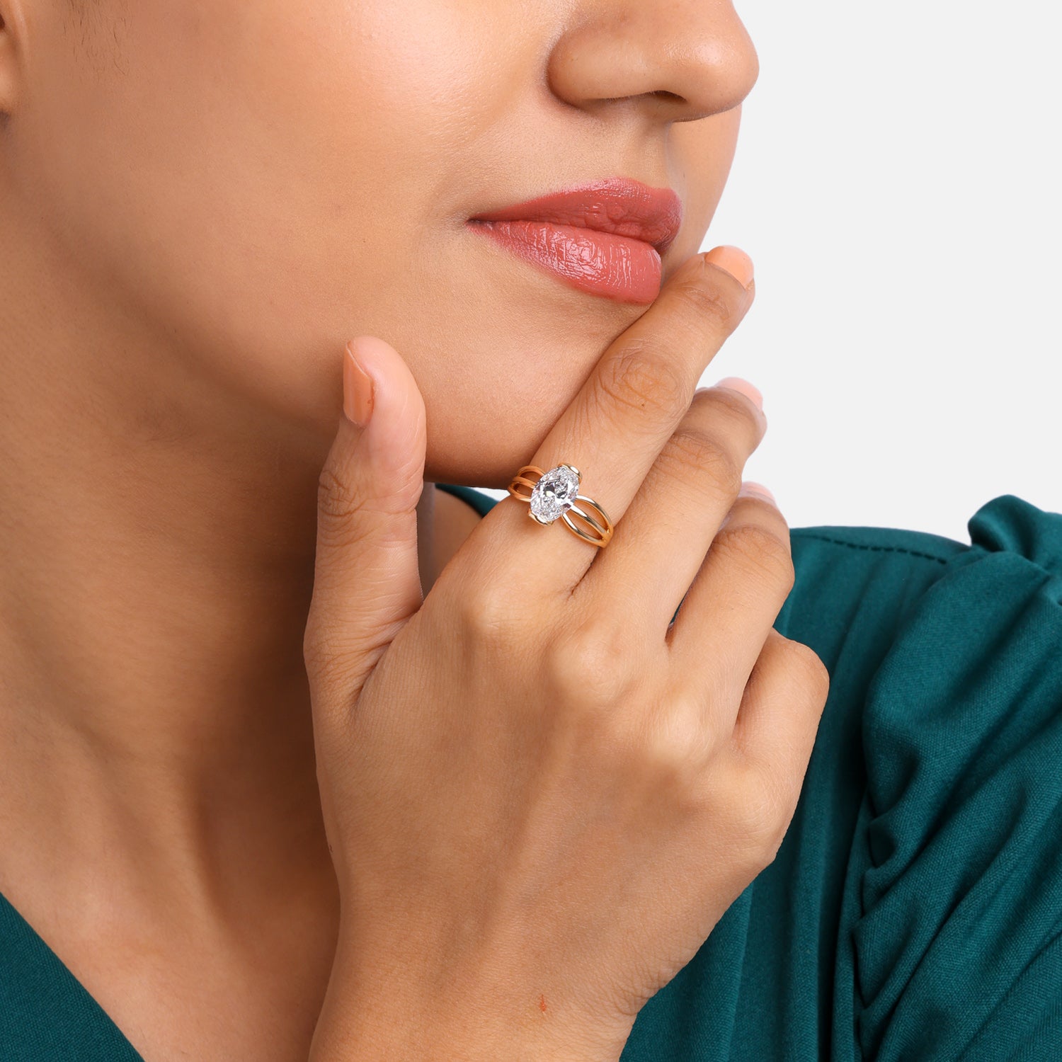 Contemporary Oval-Cut Solitaire Ring in Sculpted Gold Embrace | SKU : 0021527784