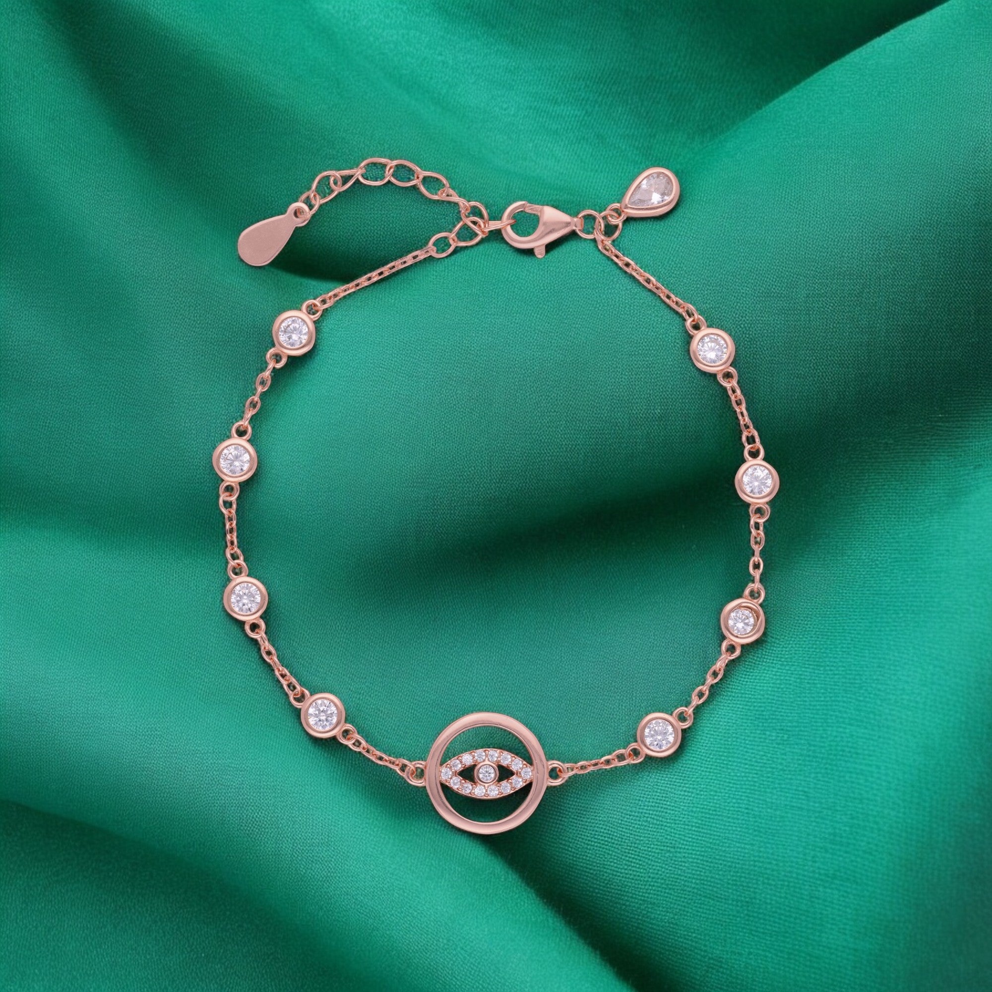 Dazzling Evil Eye Bracelet with Blue Crystal Stations in Silver and Rose Finish | SKU : 0021546044, 0021546051, 0021546068, 0021546037