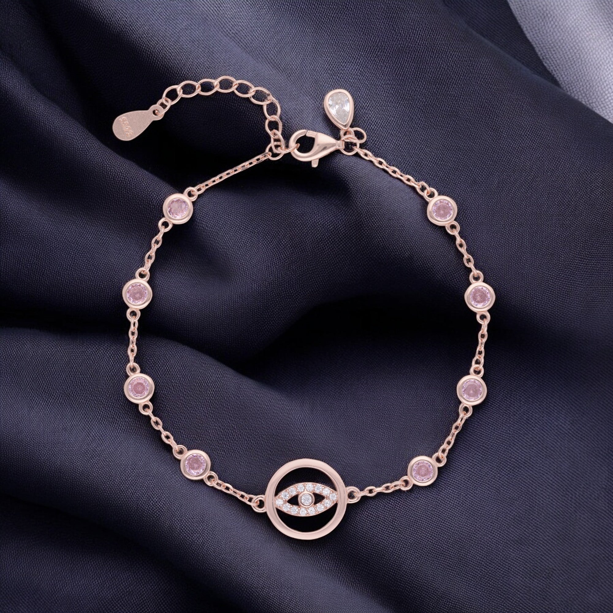 Dazzling Evil Eye Bracelet with Blue Crystal Stations in Silver and Rose Finish | SKU : 0021546044, 0021546051, 0021546068, 0021546037